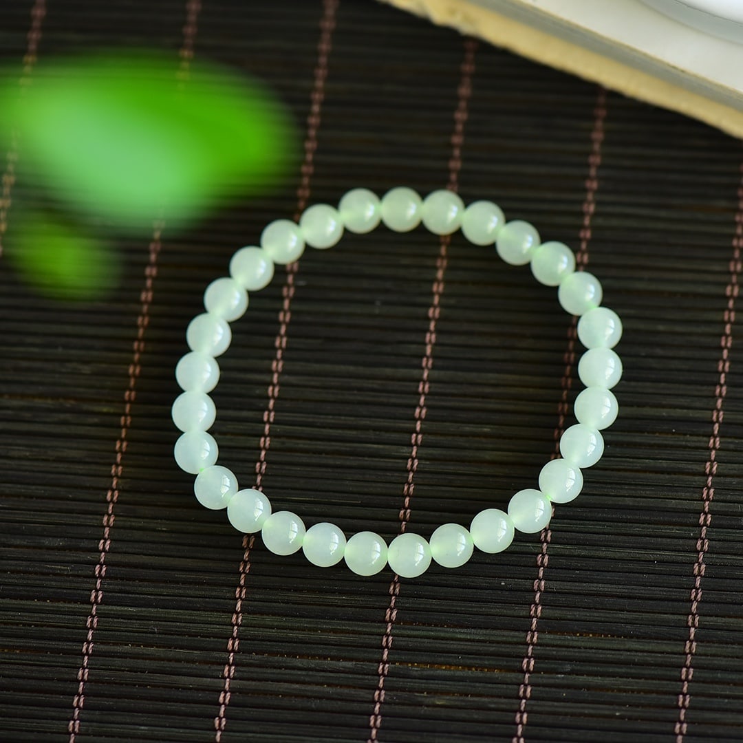An Exquisite Greenish Jade Bracelets: An Exquisite Greenish Jade Bracelets,Size:6mm 青白玉手串