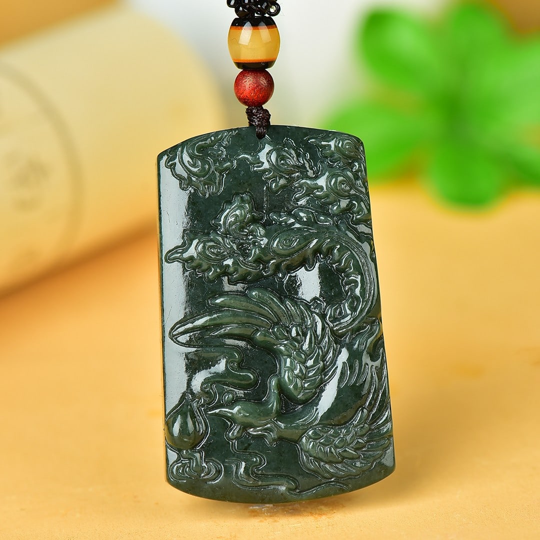 An Exquisite Sapphire Auspicious Cloud and Phoenix Pattern Pendant: An Exquisite Sapphire Auspicious Cloud and Phoenix Pattern Pendant,Size:35mmx58mm 寓意:前程似锦 青玉祥云凤纹牌