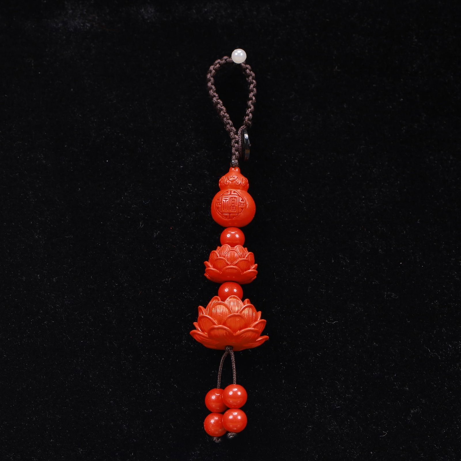 An Exquisite Cinnabar Lotus Pattern Pendant: An Exquisite Cinnabar Lotus Pattern Pendant,Size:0.8inx2in,Weight:16g 朱砂莲花挂件