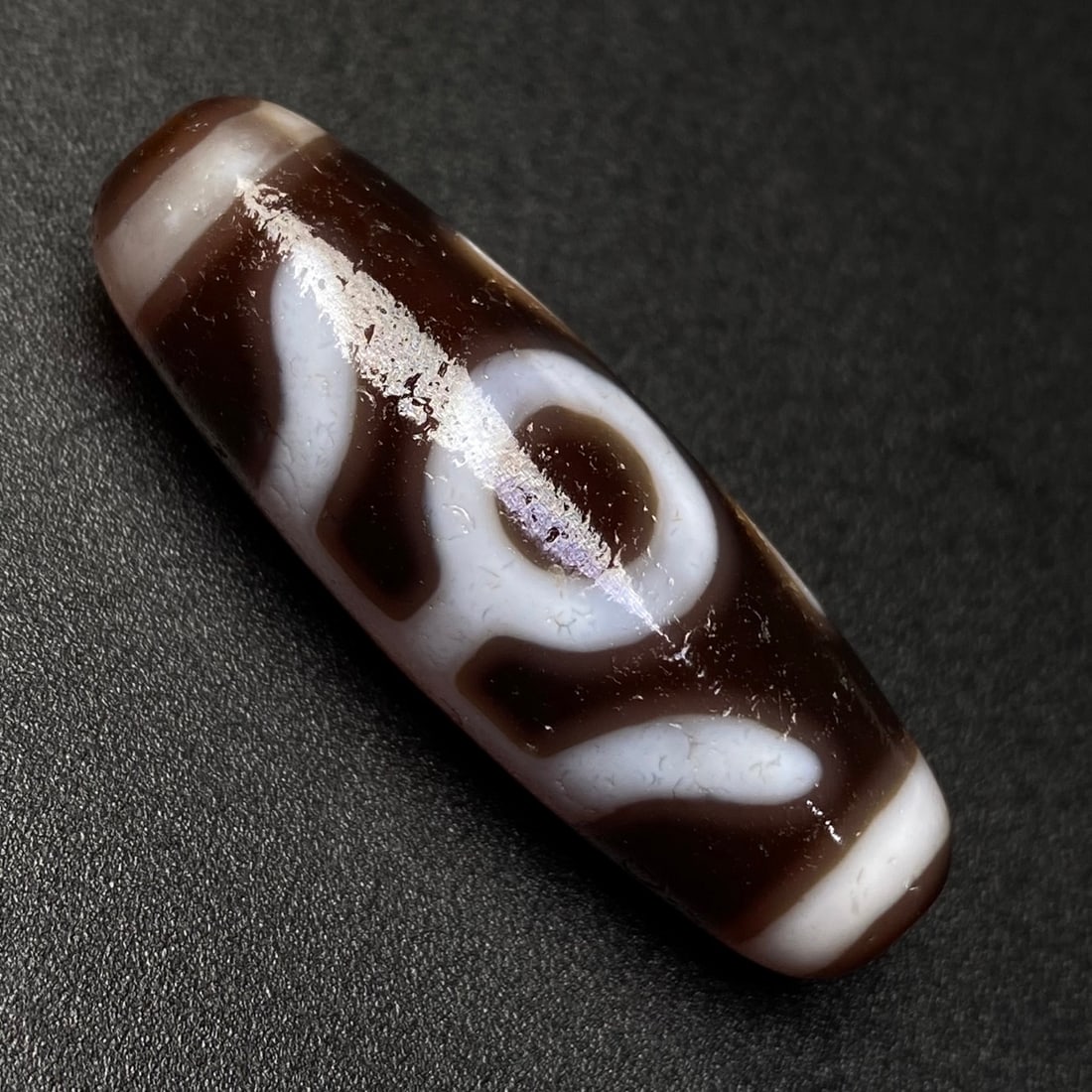 An Exquisite Dzi Bead Pendant: An Exquisite Dzi Bead Pendant,Size:36mmx12mm,Weight8.1g 天珠挂件
