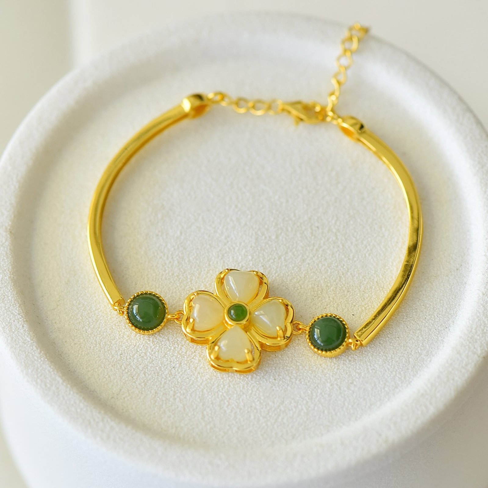 An Exquisite Sterling Silver-Gold Plated Inlaid White Jade Bracelet: An Exquisite Sterling Silver-Gold Plated Inlaid White Jade Bracelet 纯银镀金镶白玉手镯
