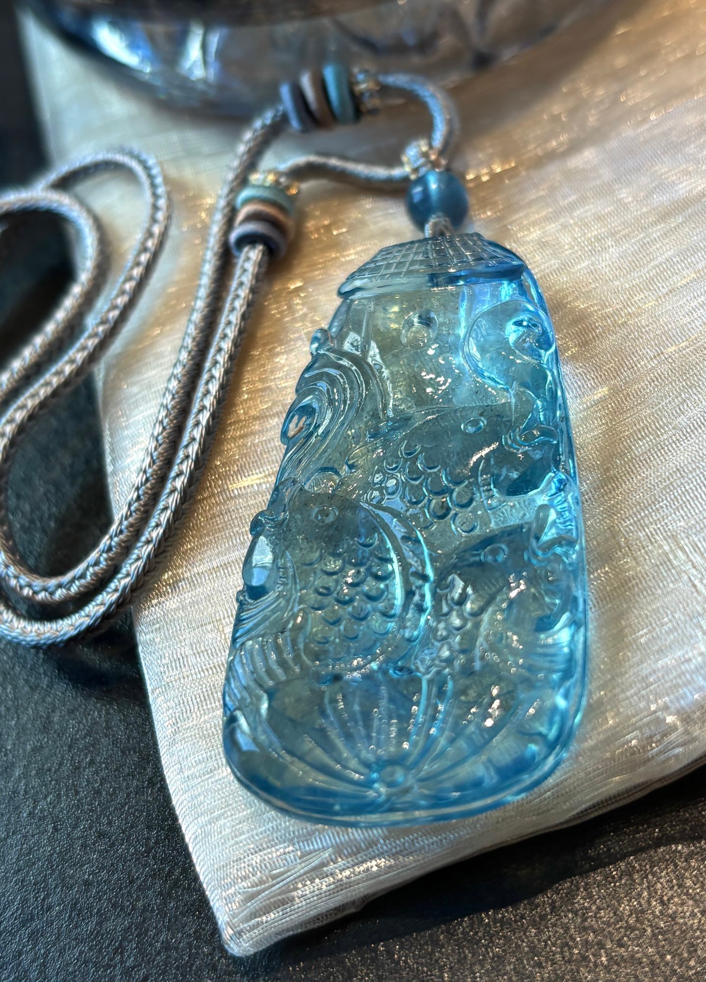 An Exquisite Aquamarine Fish Pattern Pendant: An Exquisite Aquamarine Fish Pattern Pendant,Size:24mmx28mmx10mm,Total Weight:24.7g 海蓝宝鱼纹吊坠
