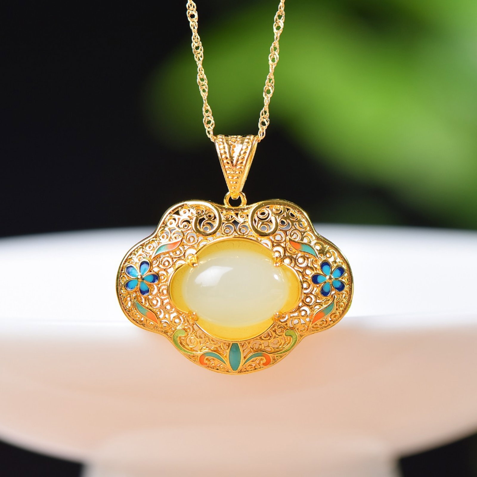 An Exquisite Sterling Silver-Gold Plated Inlaid White Jade Enamel Pendant: An Exquisite Sterling Silver-Gold Plated Inlaid White Jade Enamel Pendant,Size:10mmx14mm 纯银镀金镶白玉珐琅吊坠