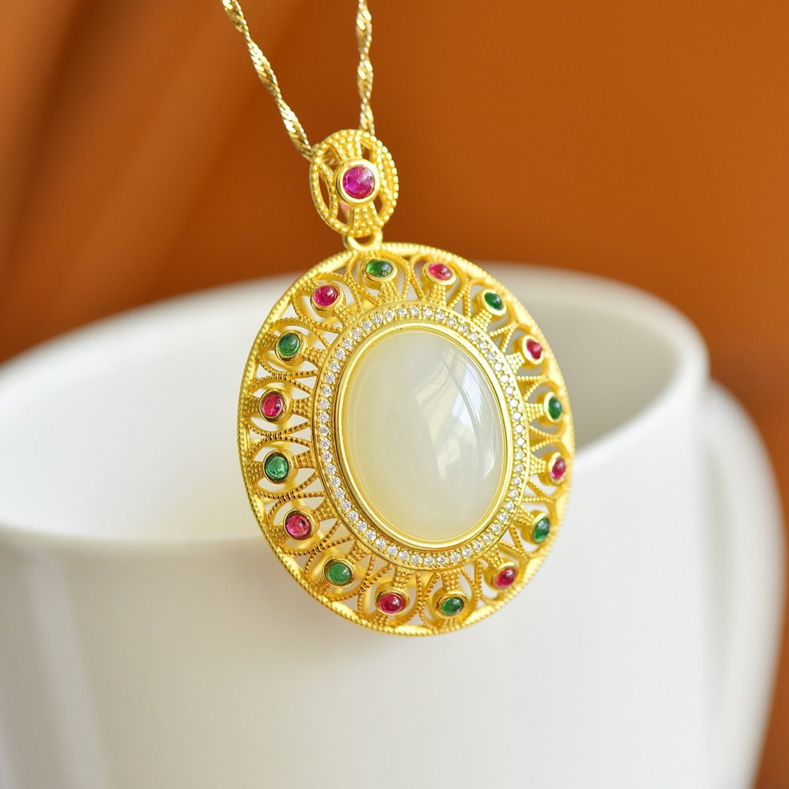 An Exquisite Sterling Silver-Gold Plated Inlaid White Jade Pendant,Inlaid Gems: An Exquisite Sterling Silver-Gold Plated Inlaid White Jade Pendant,Inlaid Gems,Size:15mmx20mm 纯银镀金镶白玉吊坠,嵌宝石