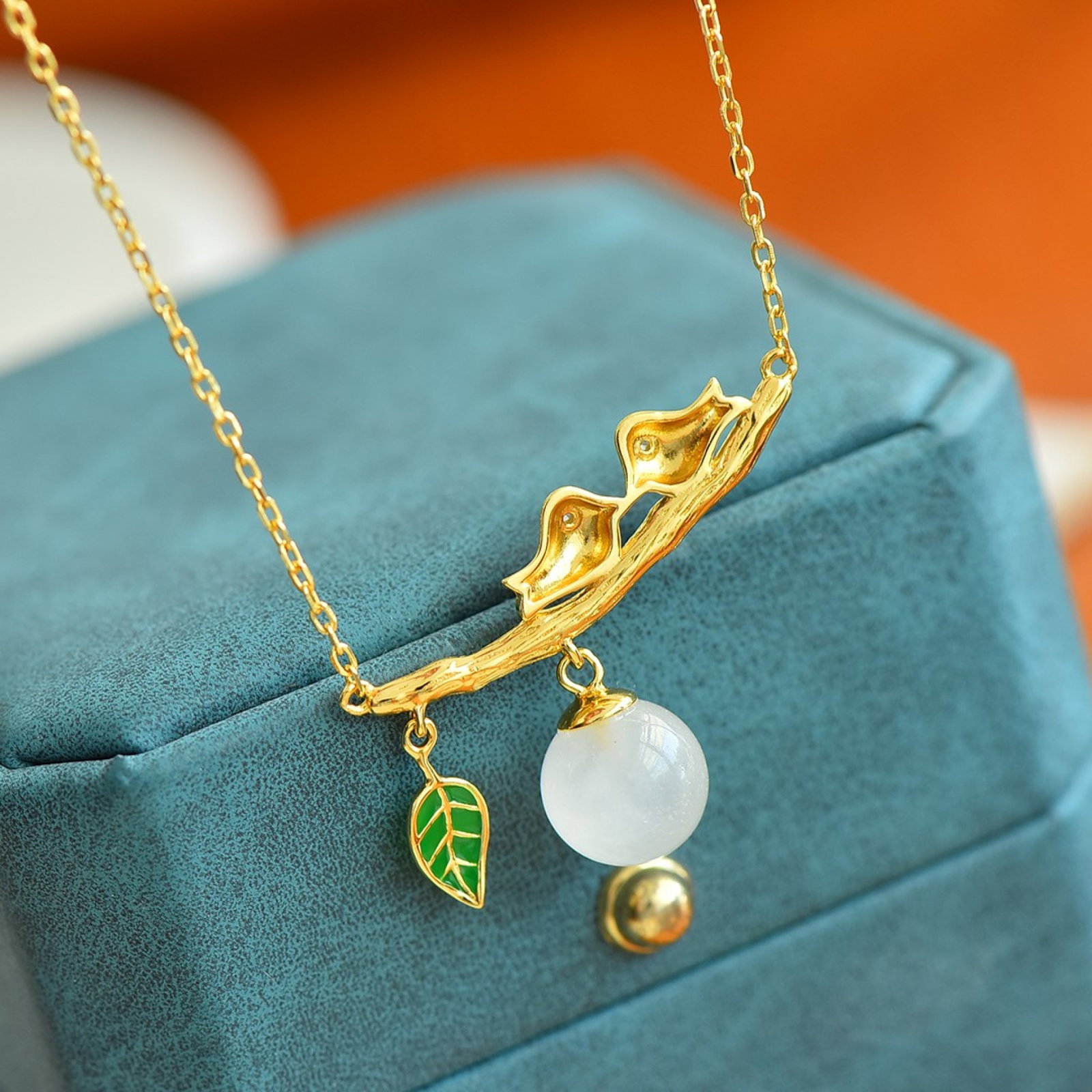 An Exquisite Sterling Silver-Gold Plated Inlaid White Jade Pendant: An Exquisite Sterling Silver-Gold Plated Inlaid White Jade Pendant,Size:10mmx10mm 一个精美的纯银镀金镶白玉吊坠