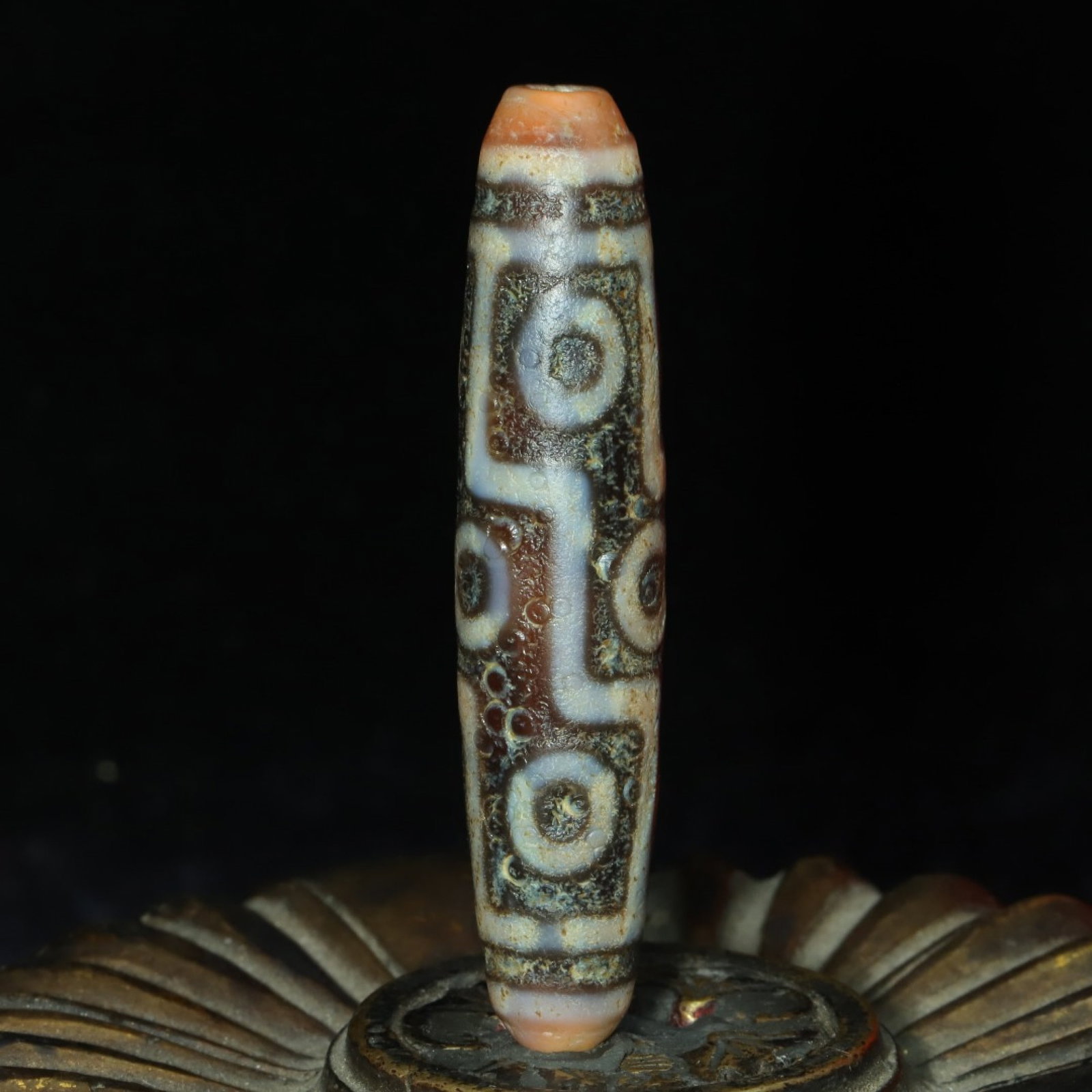An Exquisite Nine Eyes Dzi Bead Pendant: An Exquisite Nine Eyes Dzi Bead Pendant,Size:56mmx11mm,Weight:12g 九眼天珠挂件
