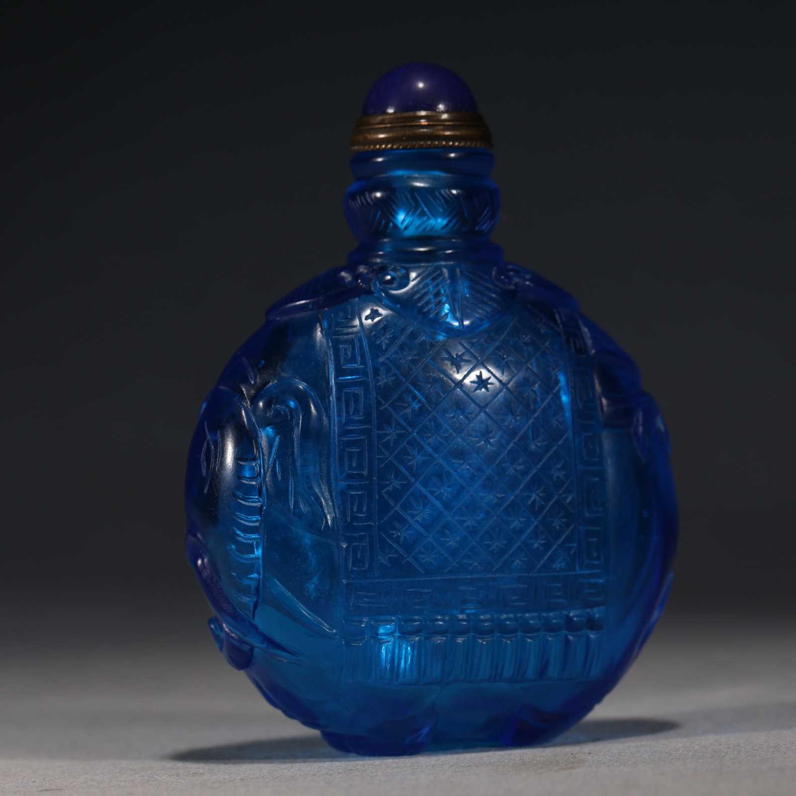 An Exquisite Blue Glass Snuff Bottle With Peaceful Elephant Pattern (1 of 7)