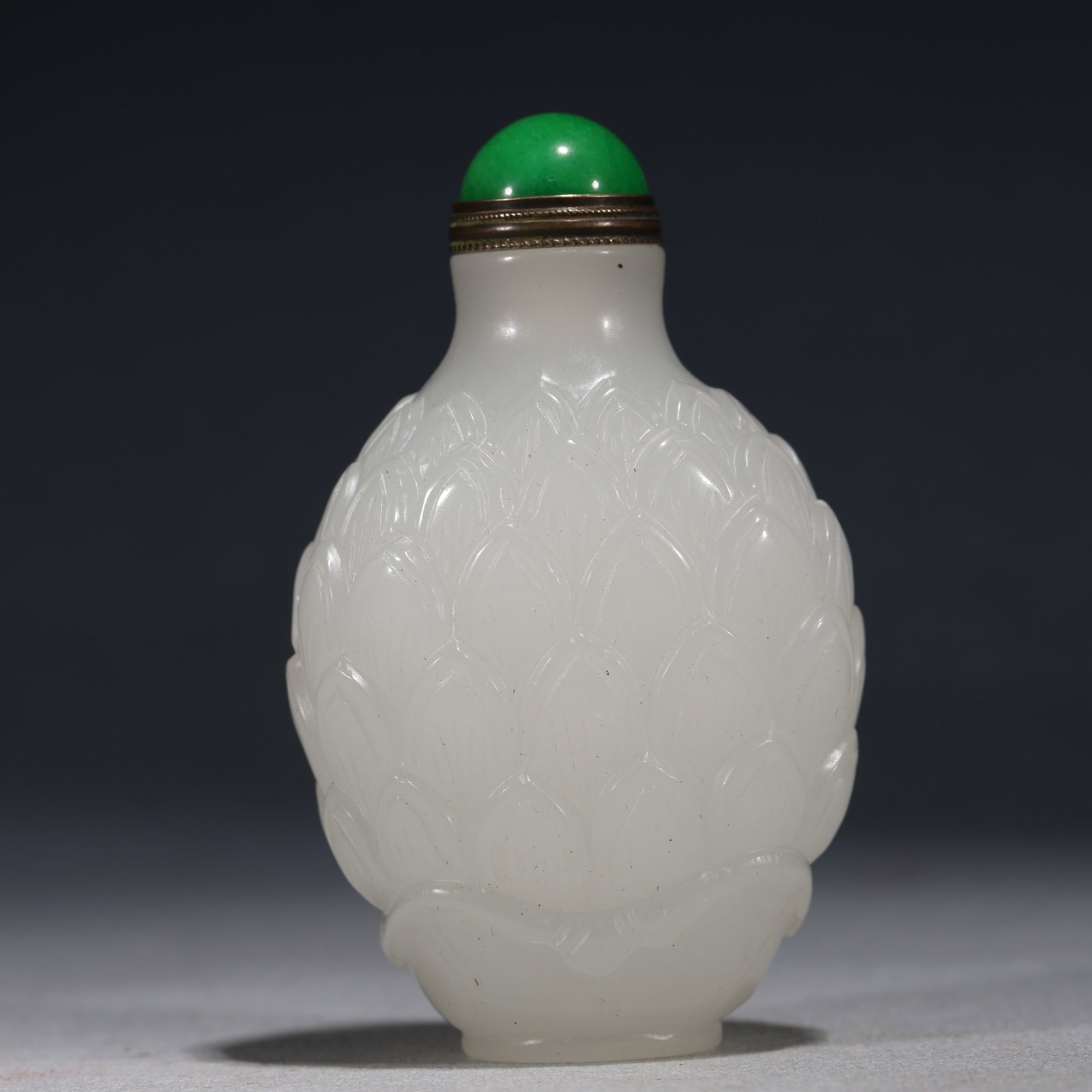 An Exquisite White Glass Snuff Bottle With Lotus Petal Pattern: An Exquisite White Glass Snuff Bottle With Lotus Petal Pattern,China,Qing Dynasty,Dimensions:3.1inx2in,白琉璃莲瓣纹鼻烟壶,中国清