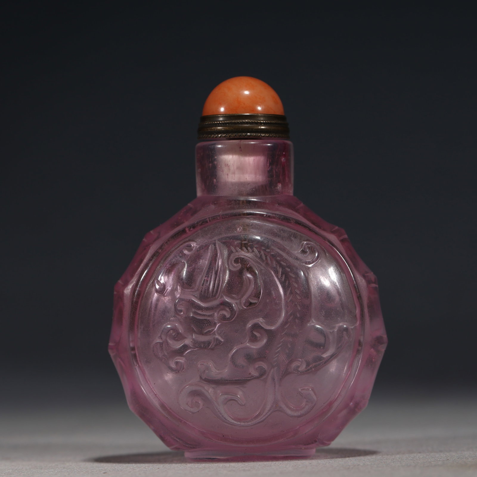 An Exquisite Pink Glass Snuff Bottle With Dragon Pattern: An Exquisite Pink Glass Snuff Bottle With Dragon Pattern,China,Qing Dynasty,Four-Character Qianlong Mark,Dimensions:2.8inx2in,粉琉璃龙纹鼻烟壶,中&
