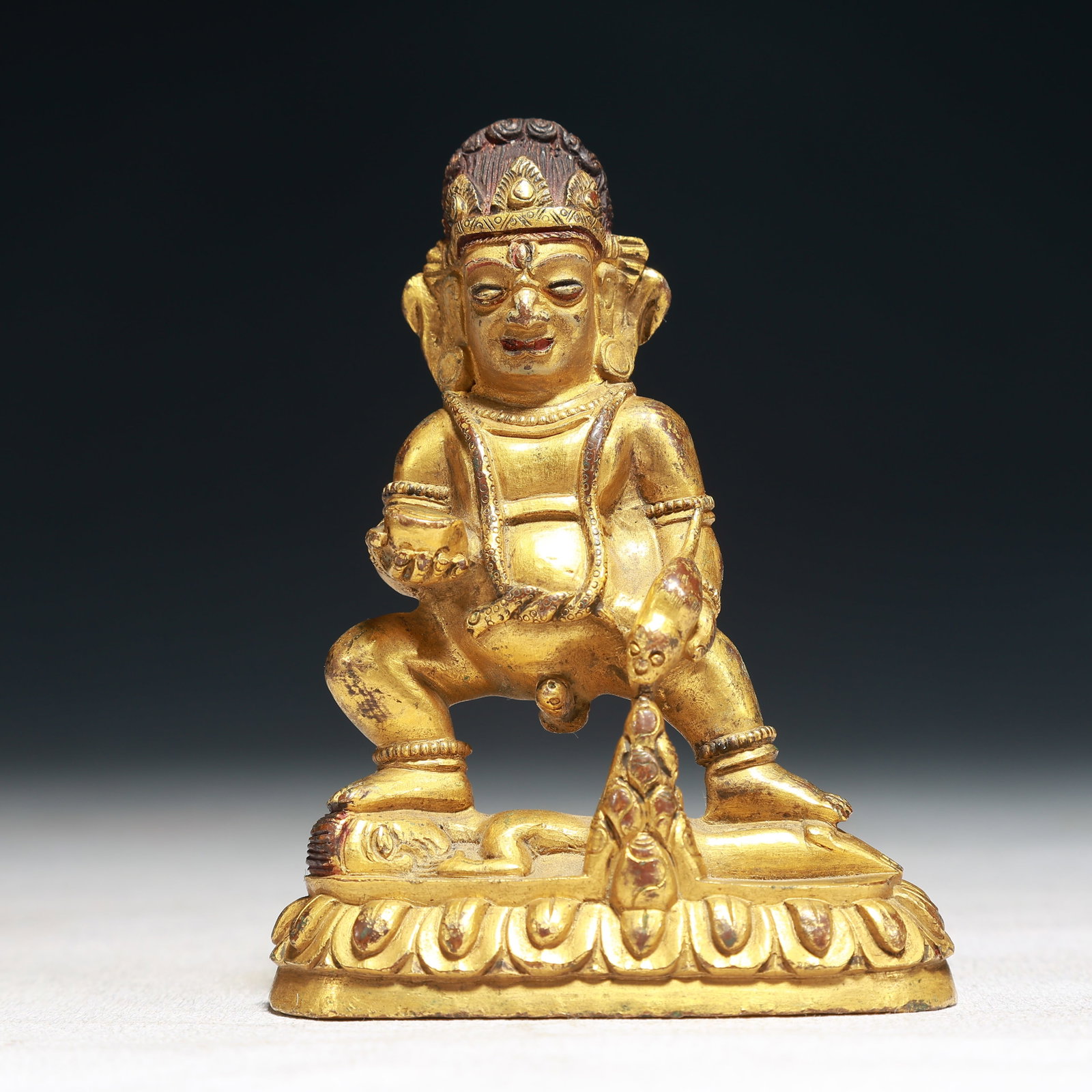A Solemn Gilt Bronze Statue of Mammon: A Solemn Gilt Bronze Statue of Mammon