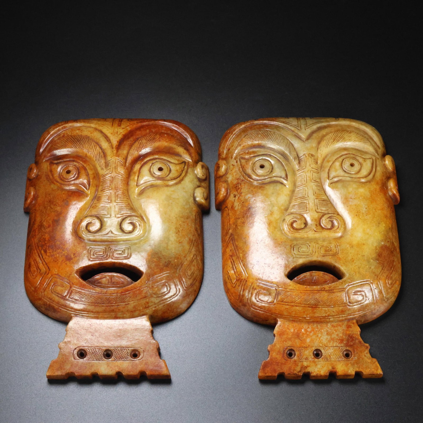 A Pair of Exquisite White Jade Figure-Face Pattern Masks: A Pair of Exquisite White Jade Figure-Face Pattern Masks