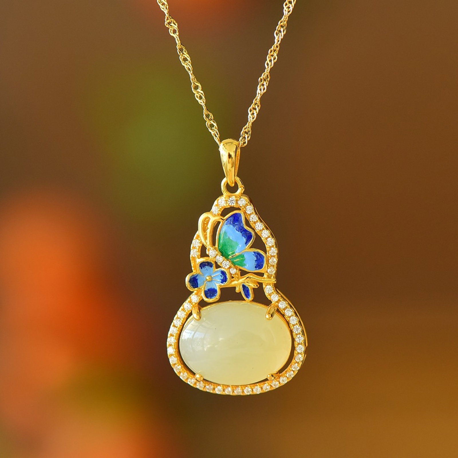 An Exquisite Sterling Silver-Gold Plated Inlaid White Jade Pendant: An Exquisite Sterling Silver-Gold Plated Inlaid White Jade Pendant
