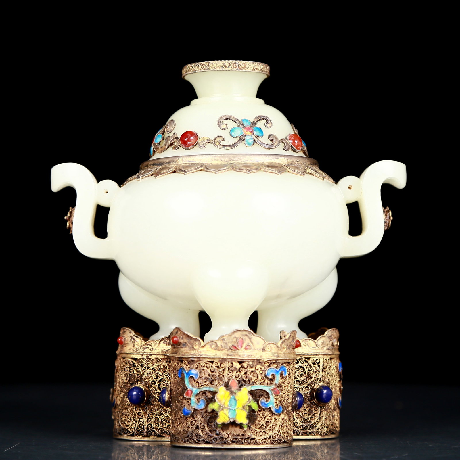An exquisite white jade covered silver gilt stove with double ears and tripod with lid