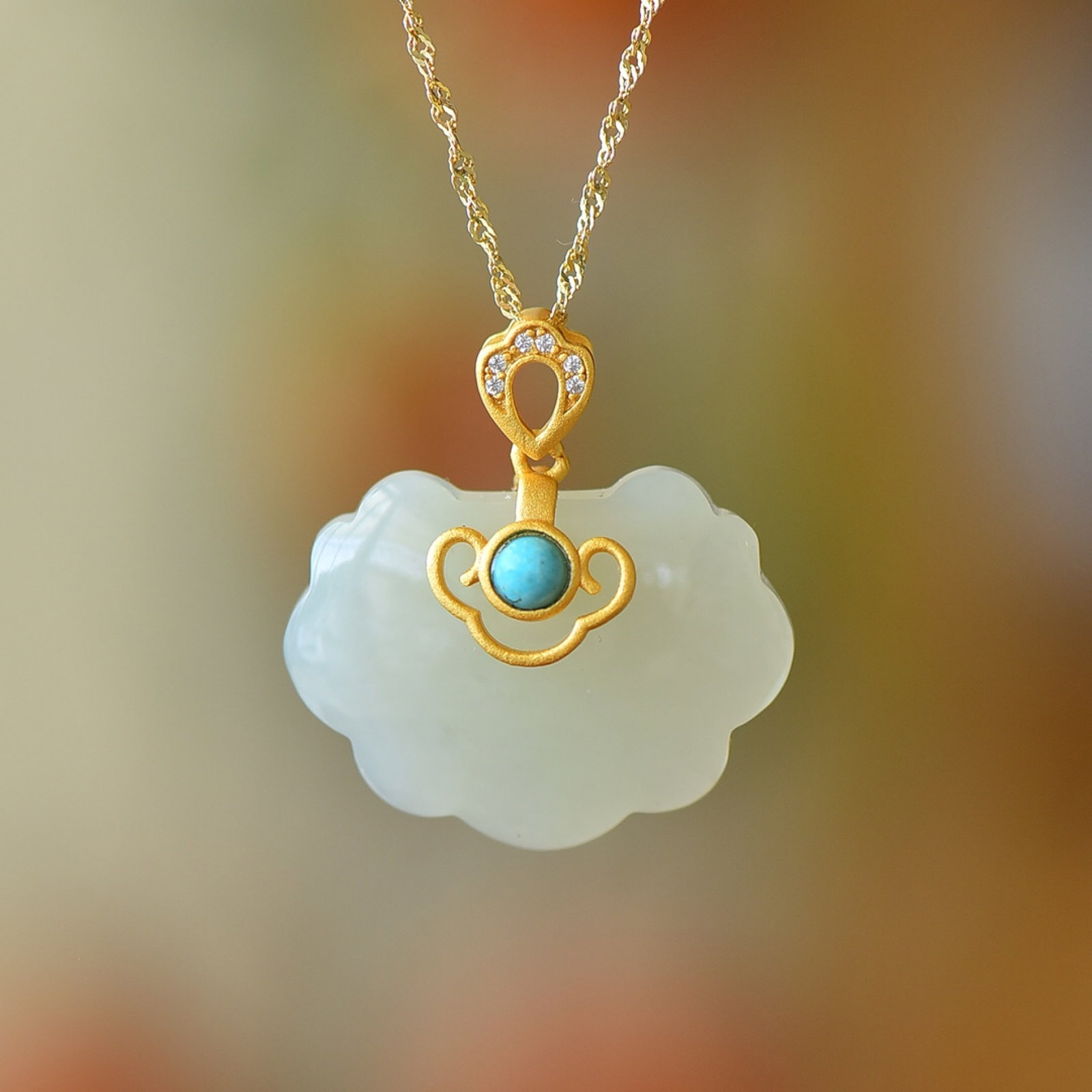 An Exquisite Sterling Silver-Gold Plated Inlaid White Jade Pendant: An Exquisite Sterling Silver-Gold Plated Inlaid White Jade Pendant