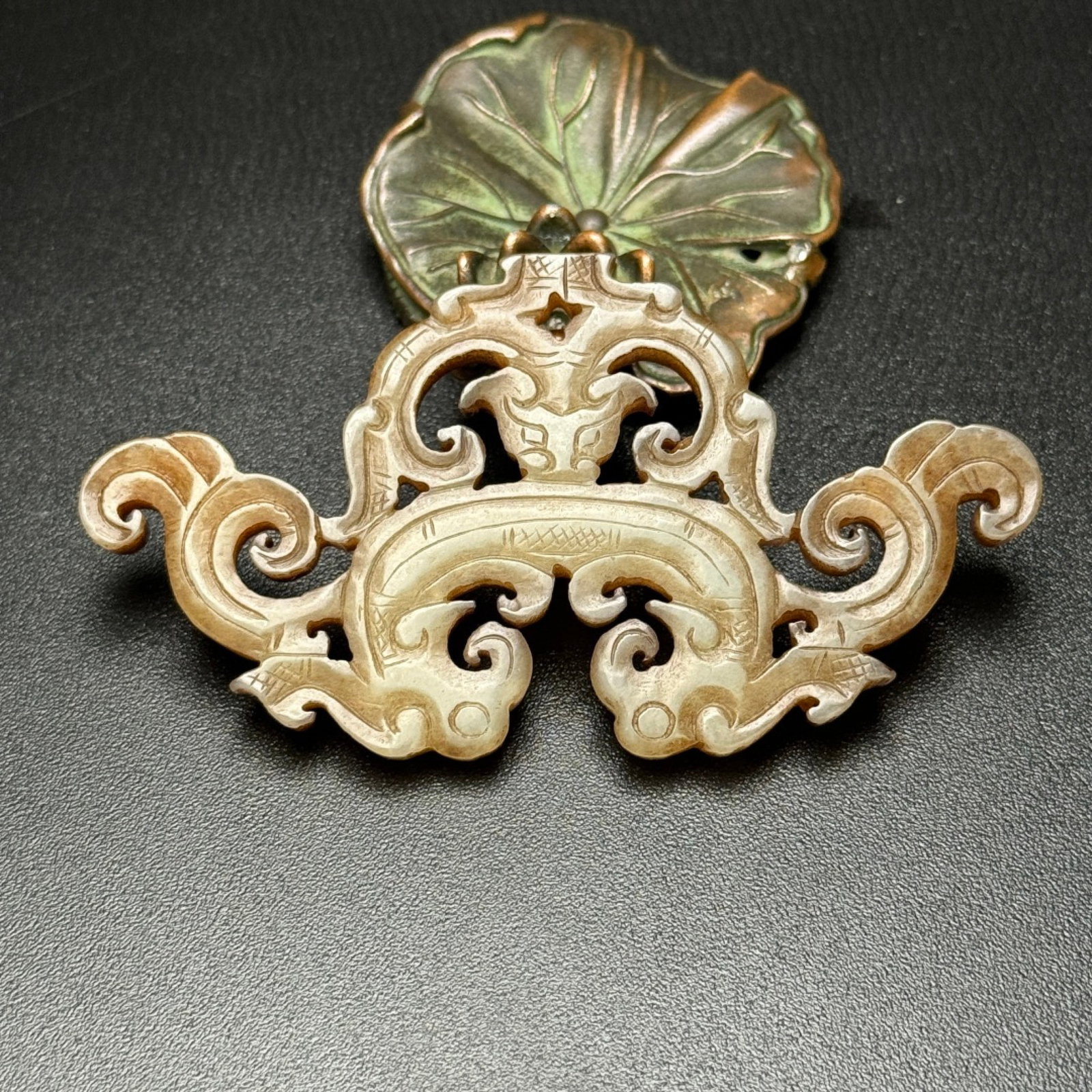An Exquisite Archaic Jade Dragon Pendant