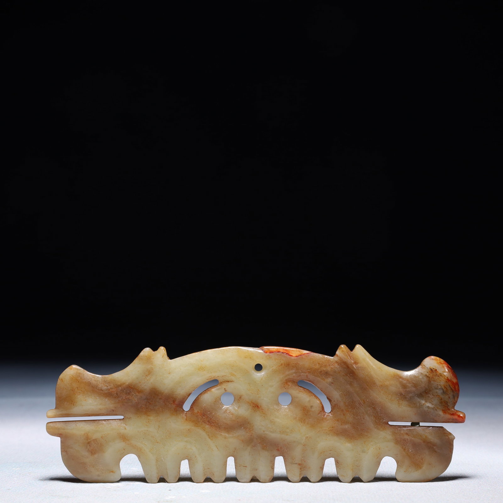 An Archaic Hongshan Culture White Jade Beast-Face Pattern Pendant