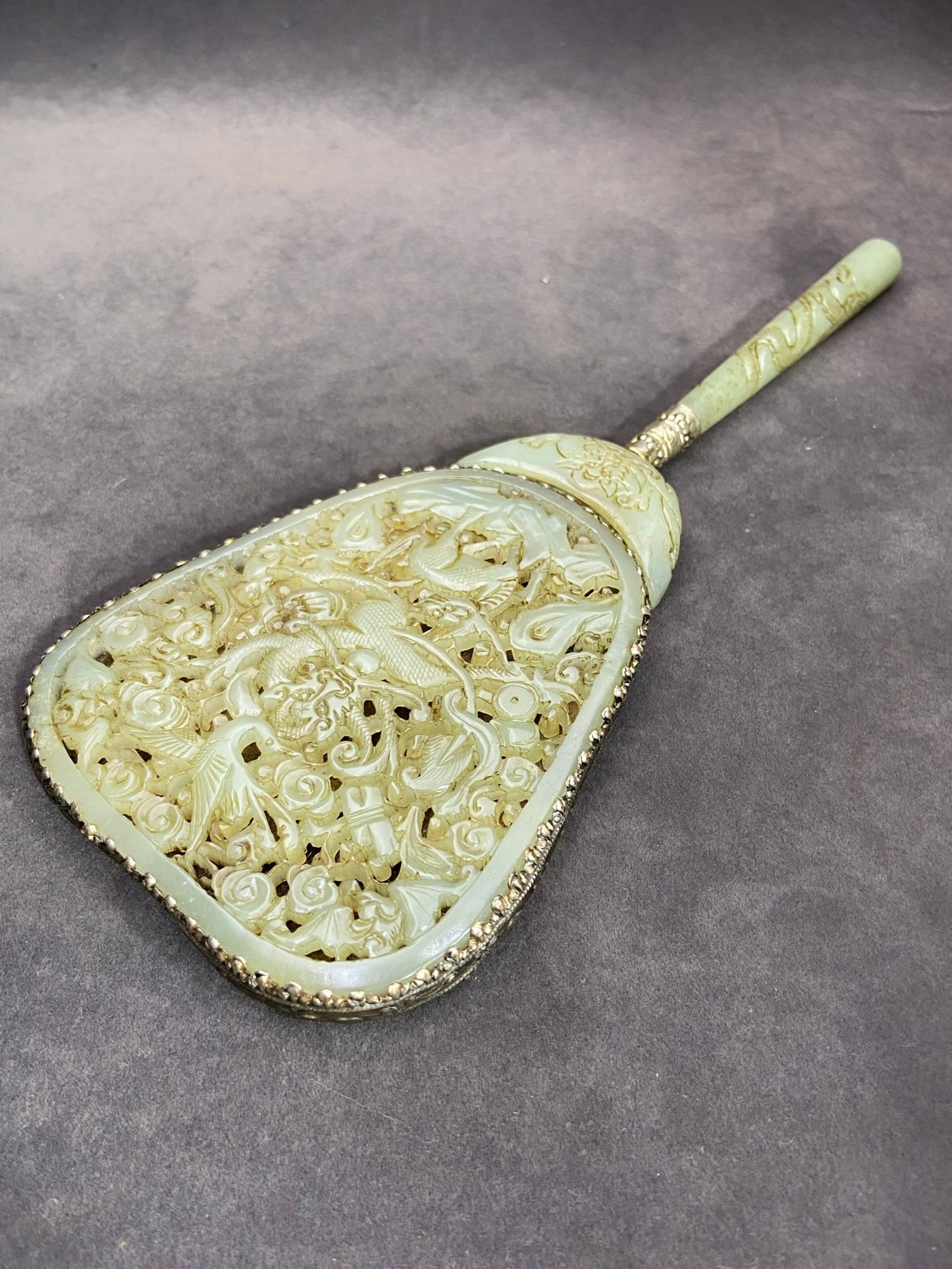 An Exquisite Silver Inlaid White Jade Hollow Auspicious Cloud and Dragon Pattern Hand Mirror (1 of 7)