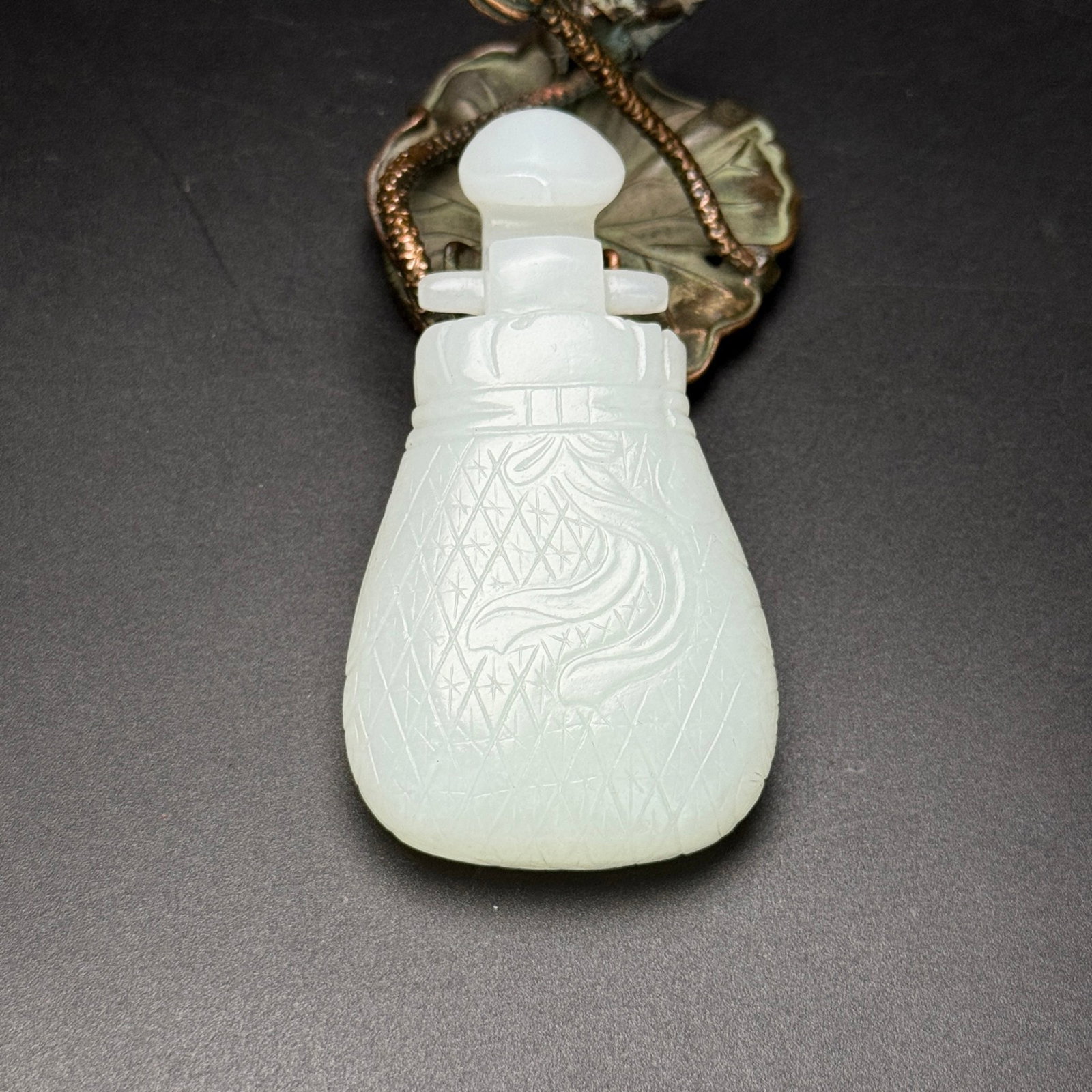 An Exquisite White Jade Pipa Pendant (1 of 7)
