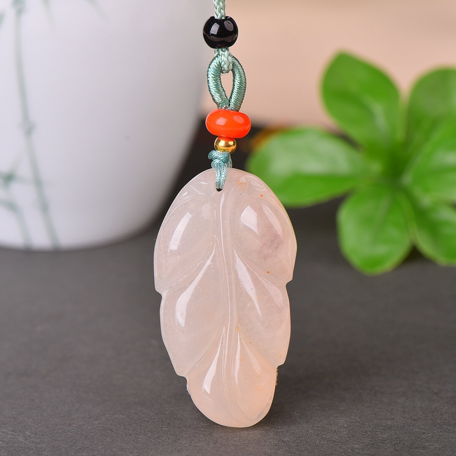 An Exquisite Red Jade Pendant (1 of 2)