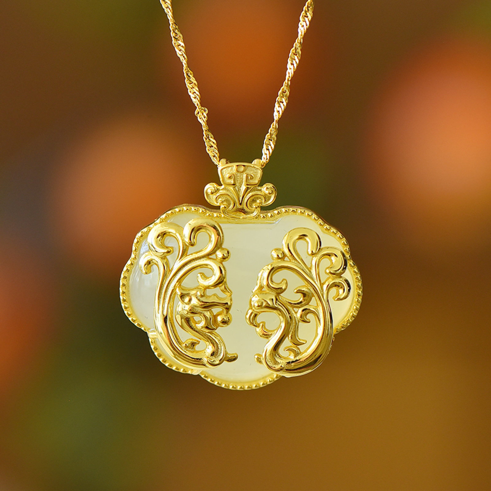 An Exquisite Sterling Silver-Gold Plated Inlaid White Jade Pendant: An Exquisite Sterling Silver-Gold Plated Inlaid White Jade Pendant