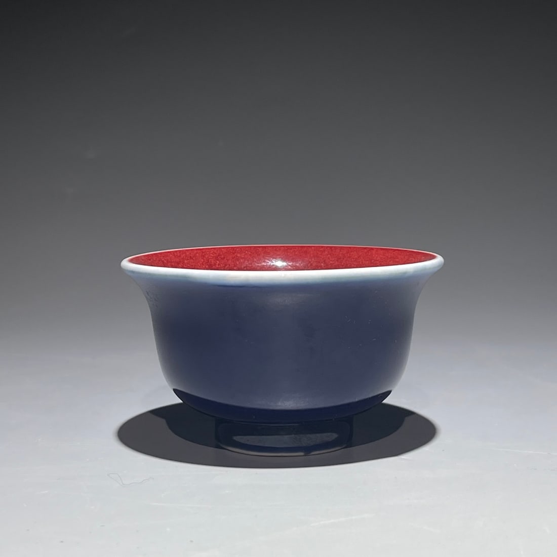 An Exquisite Ji Blue Ruby Red Glazed Cup: An Exquisite Ji Blue Ruby Red Glazed Cup,Ming Dynasty, China,Xuande Four-character Mark,Size:2.2inx3.6in 霁蓝宝石红釉杯,中国明代,ê