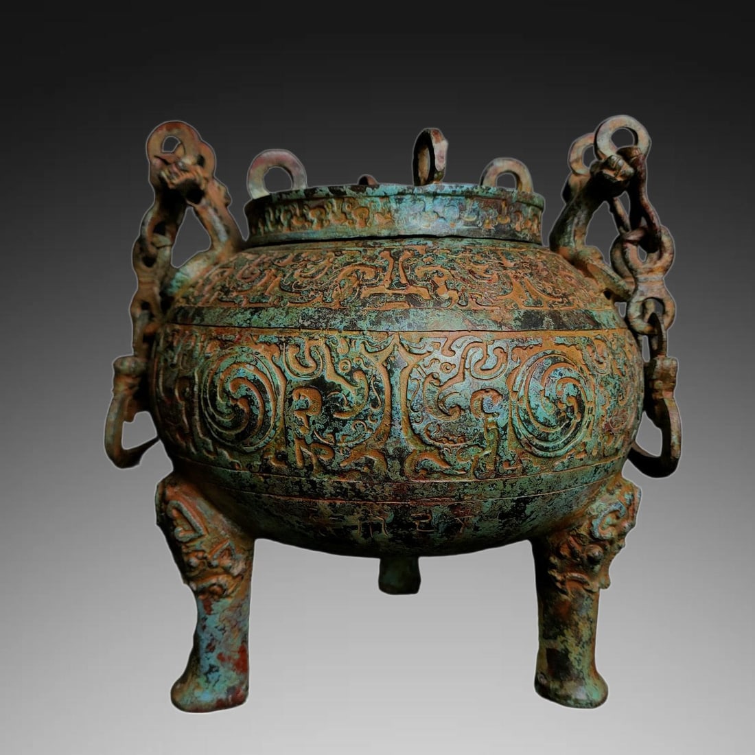 An Exquisite Bronze Tripod Ding: An Exquisite Bronze Tripod Ding,Han Dynasty, China,Size:8.7inx8.7in ,Weight:2800g 青铜三足鼎,中国汉代