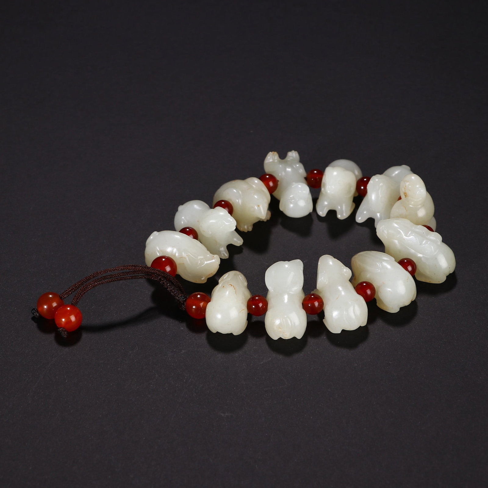 An Exquisite Hotan Jade Carved Twelve Chinese Zodiac Bracelets: An Exquisite Hotan Jade Carved Twelve Chinese Zodiac Bracelets, Qing Dynasty, China,Size:0.6inx0.9in ,Weight:80g