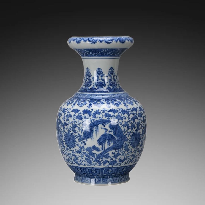 An Exquisite Blue and White Lotus Pattern Vase: An Exquisite Blue and White Lotus Pattern Vase,Qing Dynasty, China,Qianlong Six-character Mark,Size:13.8inx5.1inx8.4inx5.1in 青花缠枝莲纹瓶,中国&#