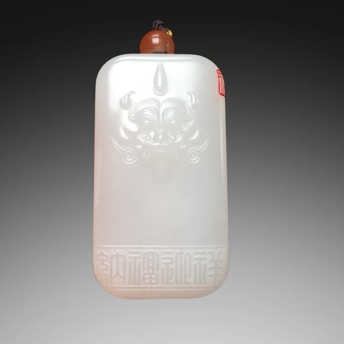 An Exquisite Hotan Jade Beast-Face Pattern Pendant: An Exquisite Hotan Jade Beast-Face Pattern Pendant,Qing Dynasty, China,Size:1.9inx1inx0.4in,Weight:35.7g 和田玉兽面纹挂件,中国清ߣ