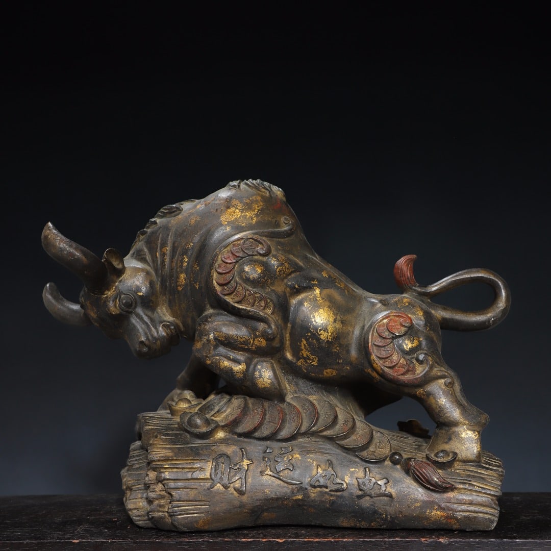 An Exquisite Bronze Gold Printed Buffalo Ornament: An Exquisite Bronze Gold Printed Buffalo Ornament,Qing Dynasty, China,Size:11inx15.7inx5.9in,Weight:6950g 铜拓金牛摆件,中国清代