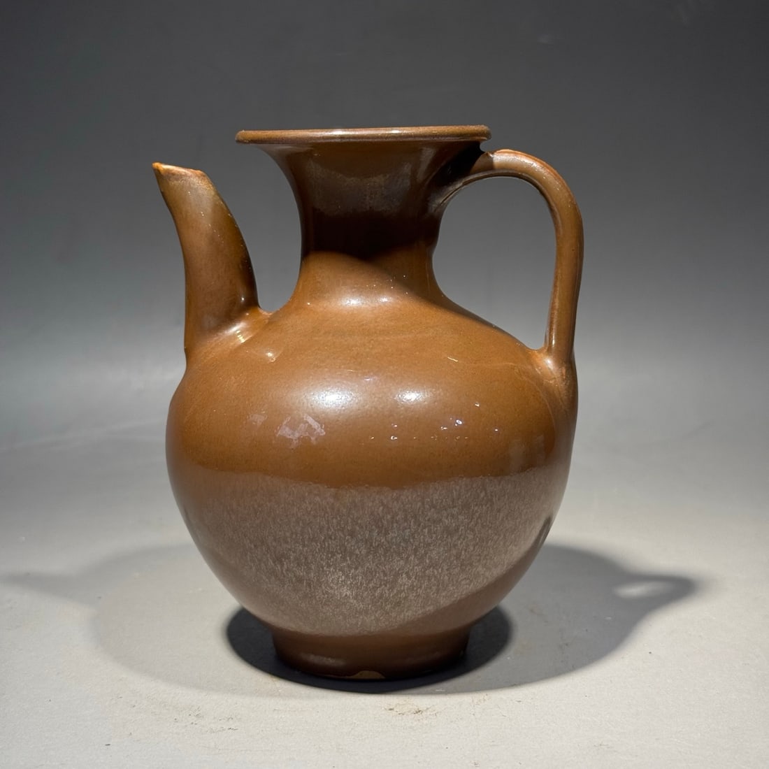 An Exquisite Yaozhou Kiln Persimmon Red Glazed Teapot: An Exquisite Yaozhou Kiln Persimmon Red Glazed Teapot,Song Dynasty, China,Size:4.7inx3.9in 耀州窑柿红釉壶,中国宋代
