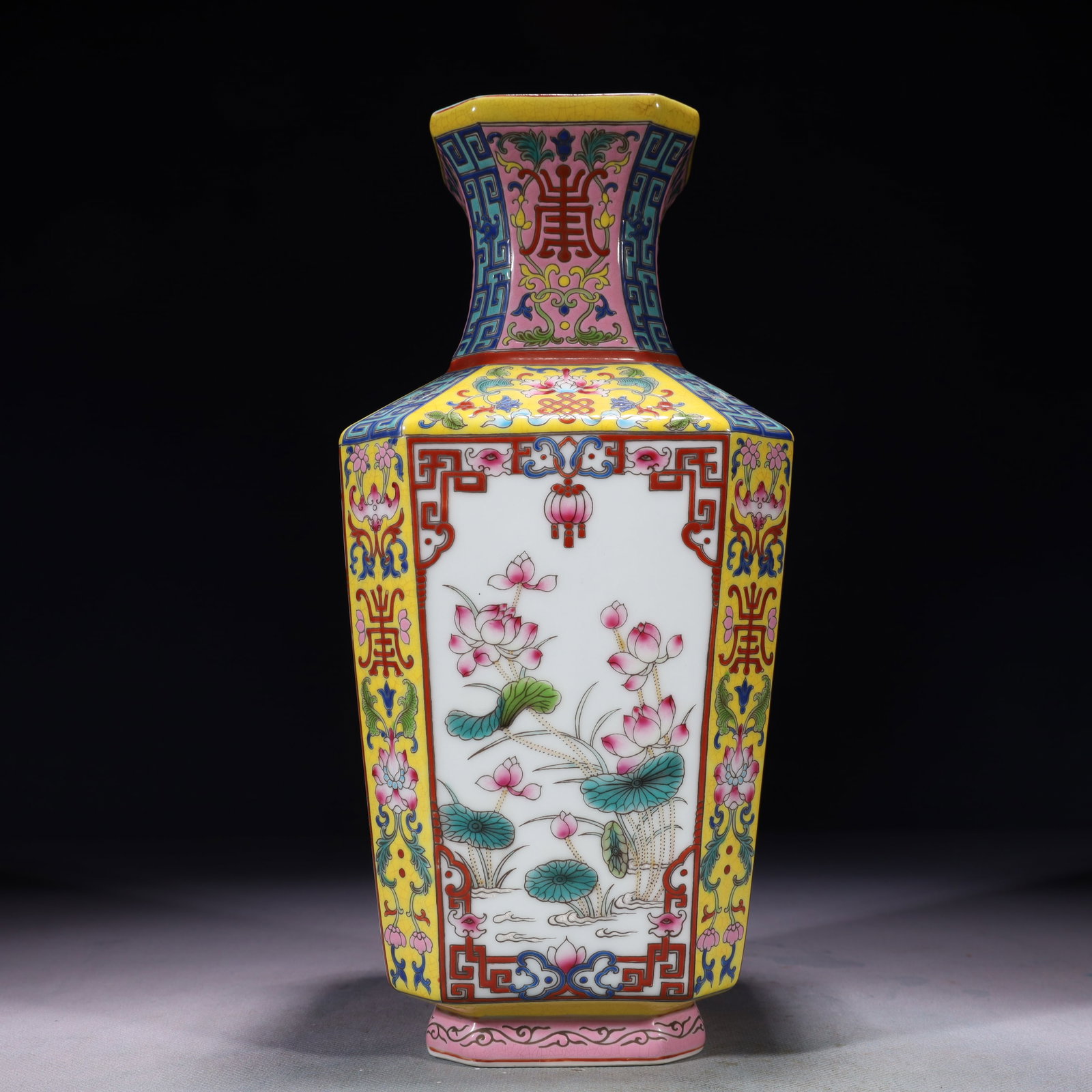 An Exquisite Yellow Ground Famille-Rose Lotus Pattern Vase: An Exquisite Yellow Ground Famille-Rose Lotus Pattern Vase,Qing Dynasty,China,Yongzheng Six-character Mark,Size:5.1inx11.2in,Weight:1450g 黄地粉彩荷花纹ல
