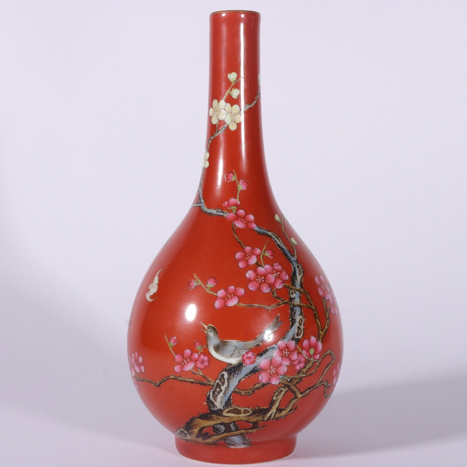 An Exquisite Coral Red Glazed Famille-Rose Painted Gold Flower and Bird Pattern Vase: An Exquisite Coral Red Glazed Famille-Rose Painted Gold Flower and Bird Pattern Vase,Qing Dynasty,China,Qianlong Six-character Mark,Size:8.9inx4.1in