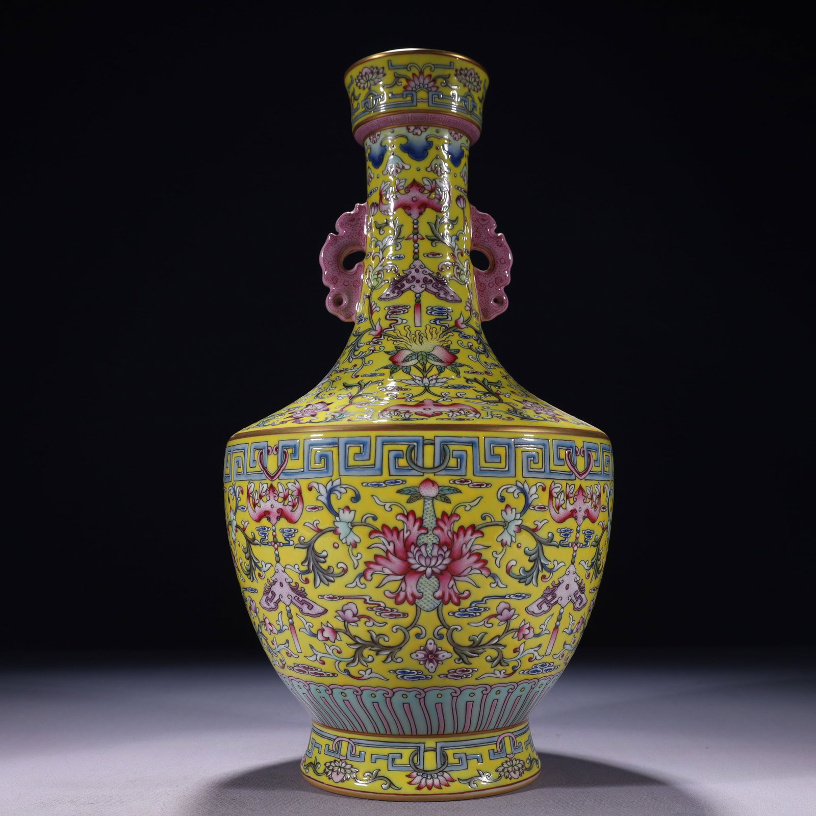 An Exquisite Yellow Ground Enamel Painted Gold Lotus Pattern Double-Ears Vase: An Exquisite Yellow Ground Enamel Painted Gold Lotus Pattern Double-Ears Vase,Qing Dynasty,China,Qianlong Six-character Mark,Size:6.7inx13.8in,Weight:2100g 黄地珐琅彩