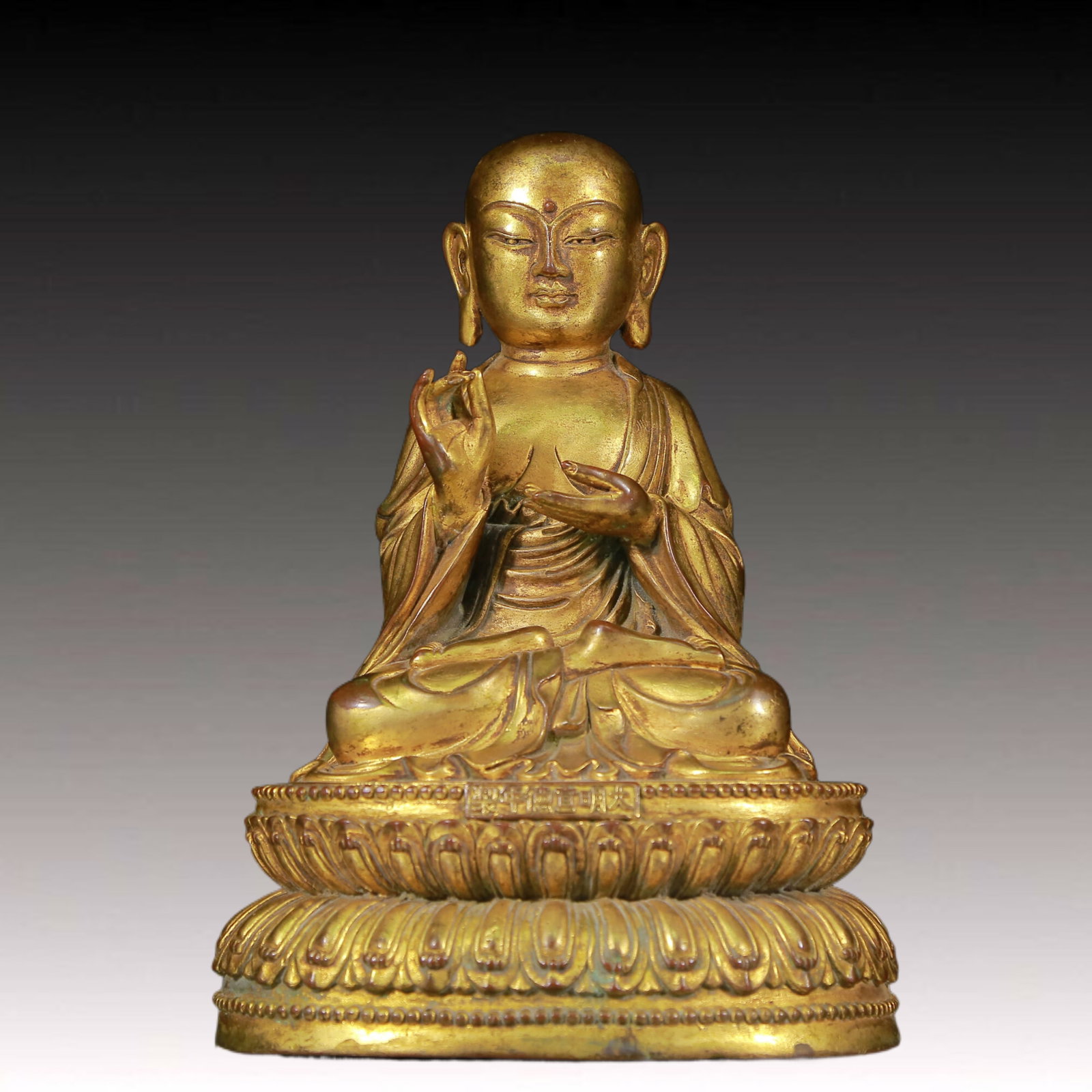 A Solemn Gilt Bronze Statue of Guru: A Solemn Gilt Bronze Statue of Guru,Ming Dynasty, China,Xuande Six-character Mark,Size: 6.7inx5.9inx9.8in,Weight:2865g 铜鎏金上师像，明代，&