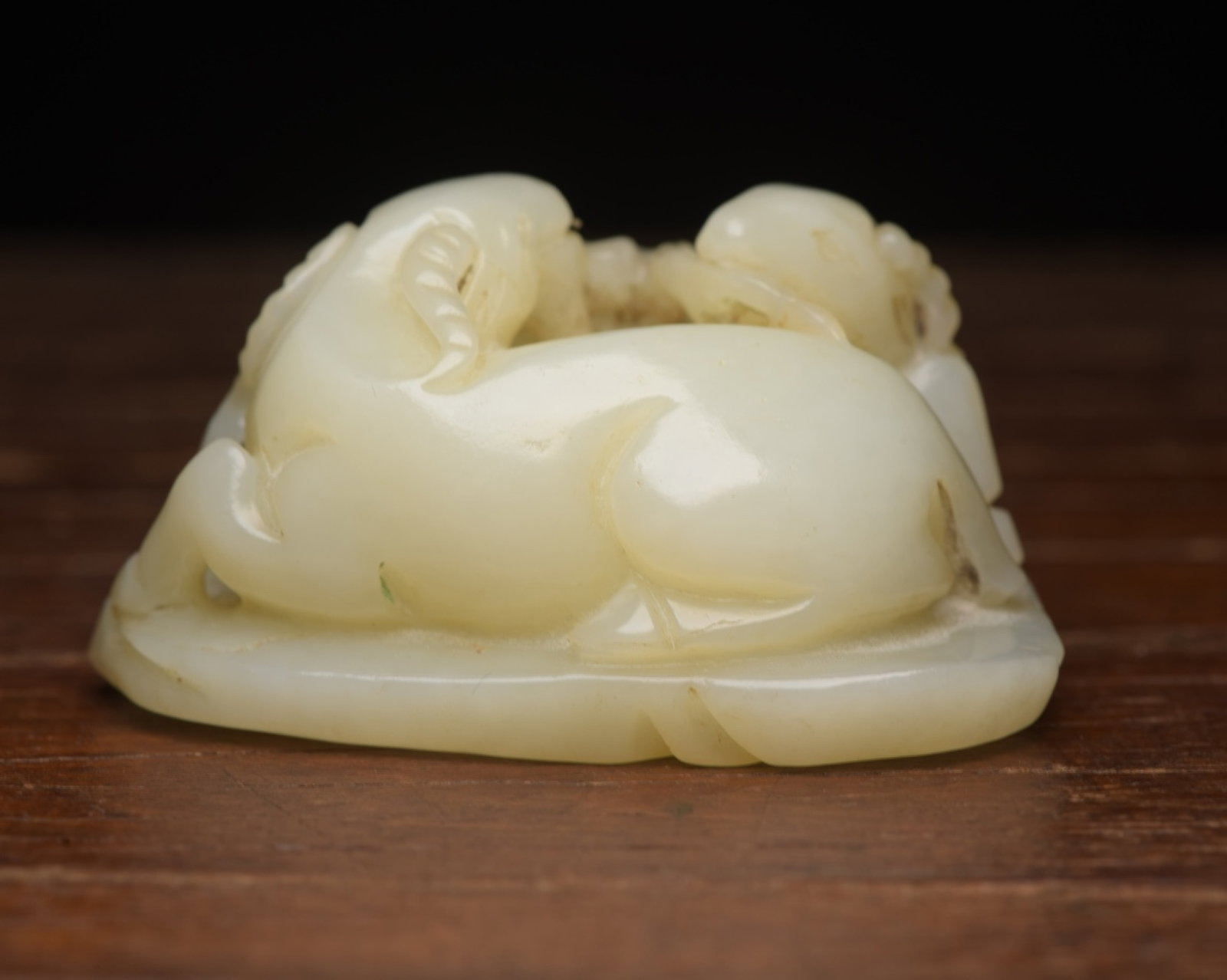 An Exquisite White Jade Sheep Ornament: An Exquisite White Jade Sheep Ornament,Qing Dynasty,China,Size:2.8inx2inx1.5in,Weight:186g 白玉羊摆件,中国清代
