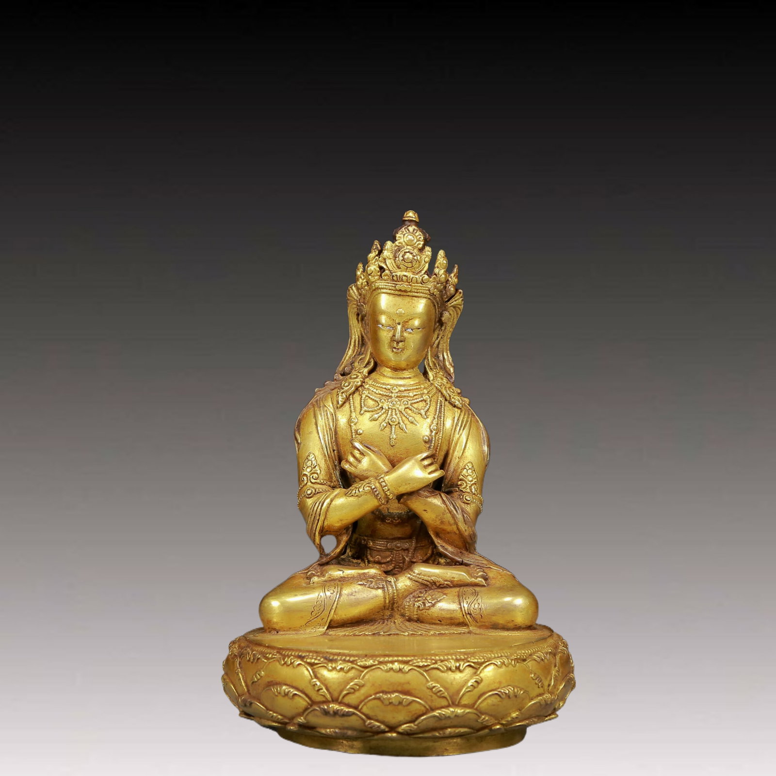 A Solemn Gilt Bronze Buddha Statue: A Solemn Gilt Bronze Buddha Statue,Ming Dynasty, China,Size:4.9inx7.9in,Weight:1820g 铜鎏金佛像，明代