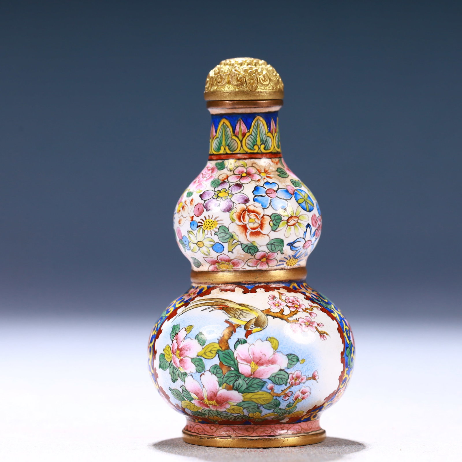 An Exquisite Painted Enamel Flower and Bird Pattern Gourd-Shaped Snuff Bottle: An Exquisite Painted Enamel Flower and Bird Pattern Gourd-Shaped Snuff Bottle,Qing Dynasty, China,Qianlong Four-character Mark,Size:1.6inx3in,Weight:65g 画珐琅花鸟纹