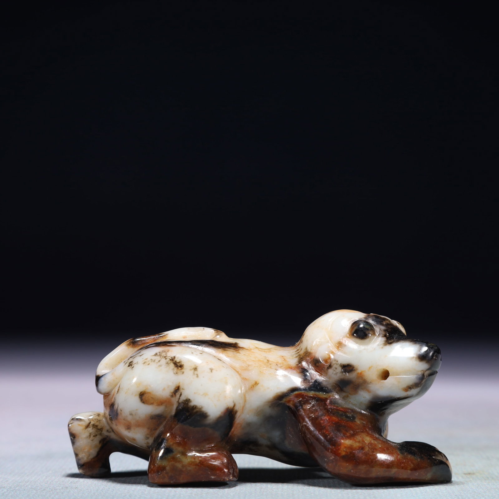 An Exquisite White Jade Dog Ornament: An Exquisite White Jade Dog Ornament,Qing Dynasty,China,Size:3.1inx1.4inx1.4in,Weight:138.2g 白玉犬摆件,中国清代