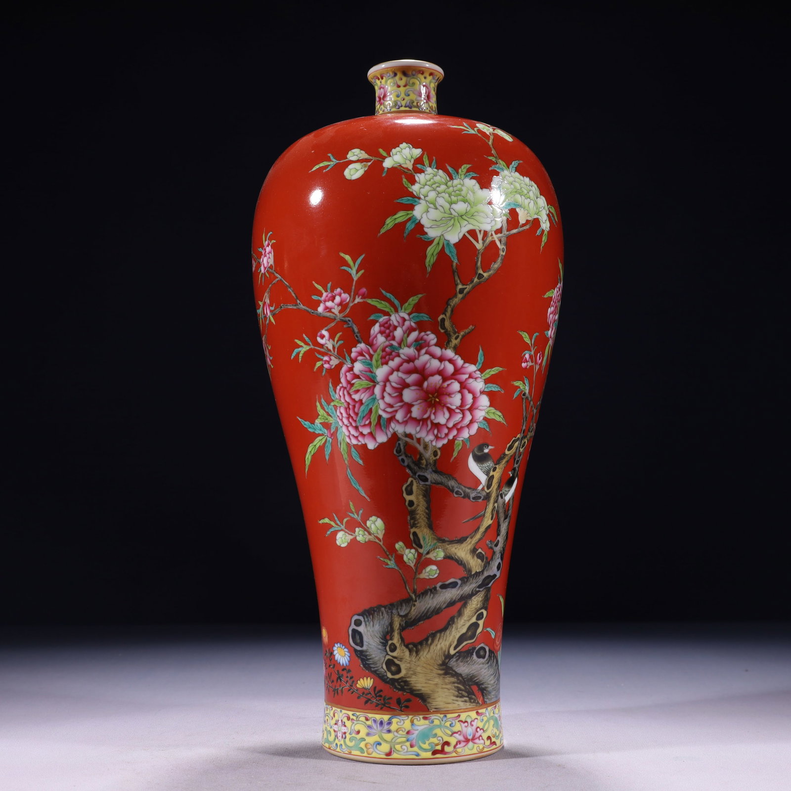 An Exquisite Red Ground Famille-Rose Painted Gold Flower and Bird Pattern Vase: An Exquisite Red Ground Famille-Rose Painted Gold Flower and Bird Pattern Vase,Qing Dynasty,China,Qianlong Six-character Mark,Size:5.5inx13.8in,Weight:1750g 红地粉彩描
