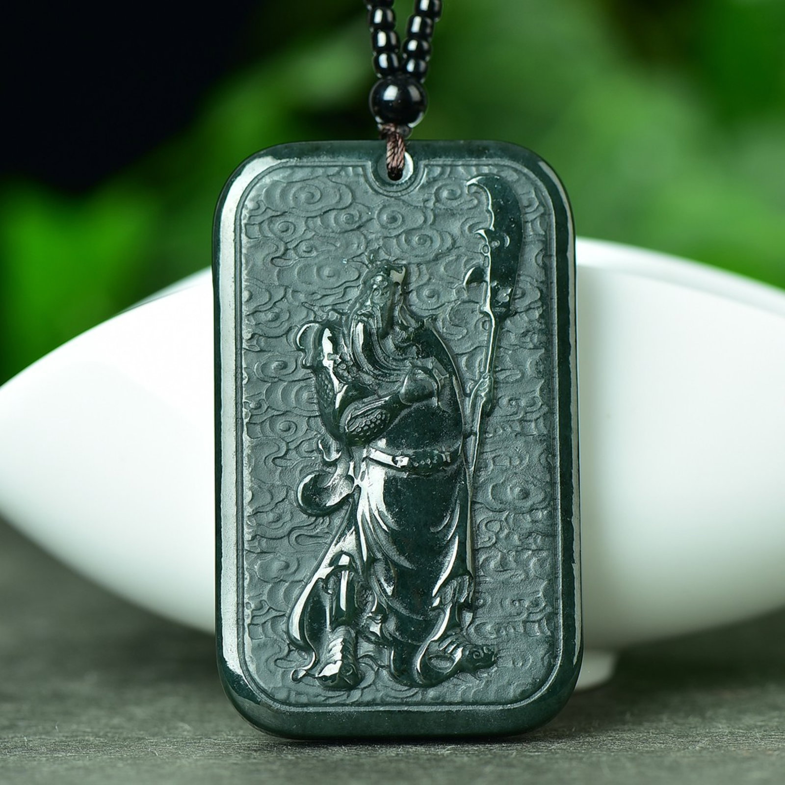 An Exquisite Sapphire Auspicious Cloud and Guangong Pattern Pendant: An Exquisite Sapphire Auspicious Cloud and Guangong Pattern Pendant,Size:1.5inx2.5in 寓意:吉祥 平安
