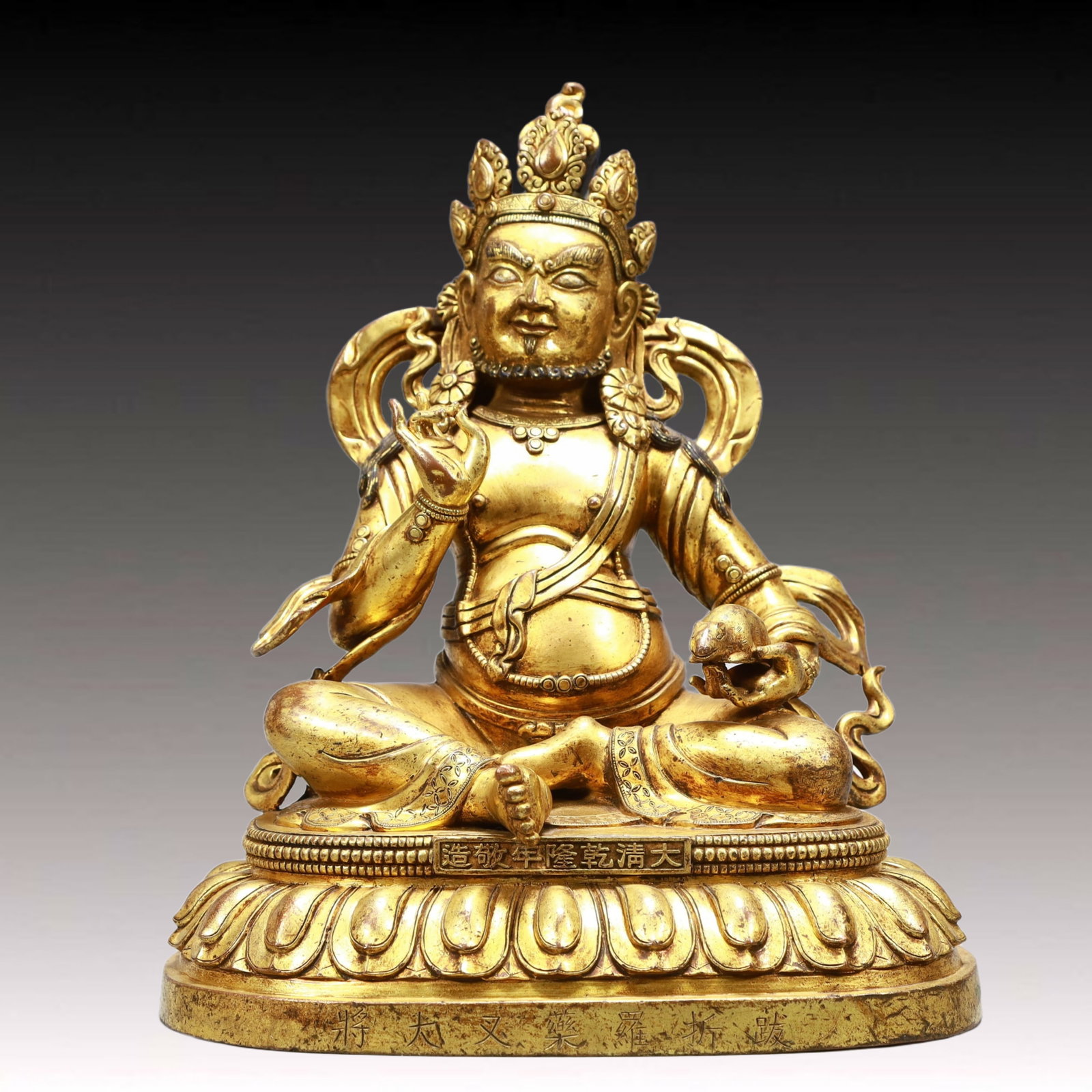 A Solemn Gilt Bronze Statue of Mammon: A Solemn Gilt Bronze Statue of Mammon,Qing Dynasty, China,Qianlong Mark,Size:9.8inx7.3inx11.4in,Weight:5950g 铜鎏金财神像,中国清代,乾&