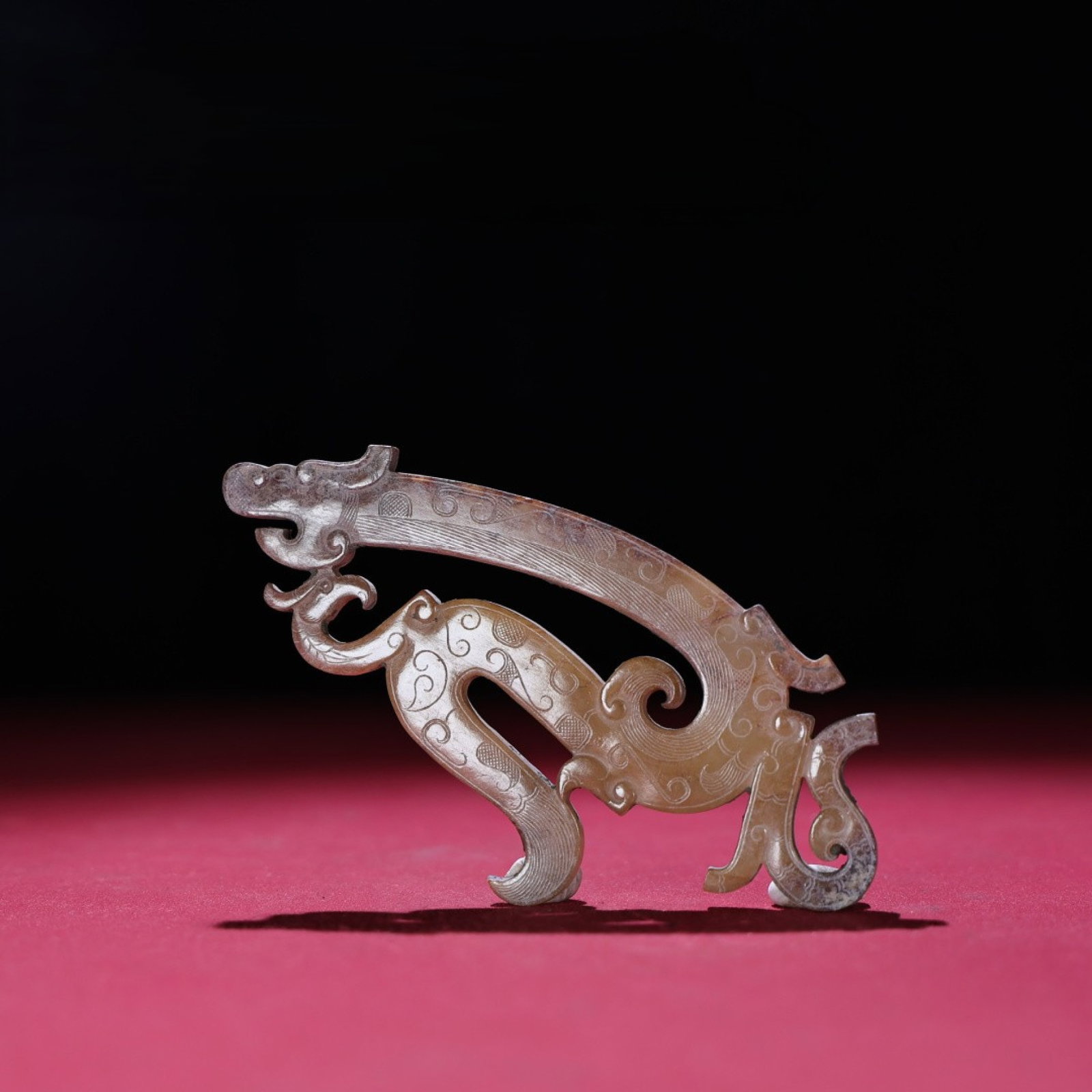 An Exquisite Archaic Jade Dragon Pendant: An Exquisite Archaic Jade Dragon Pendant,Ancient Time,China,Size:5inx2.6inx0.2in,Weight:51g 高古玉龙佩,中国远古时期
