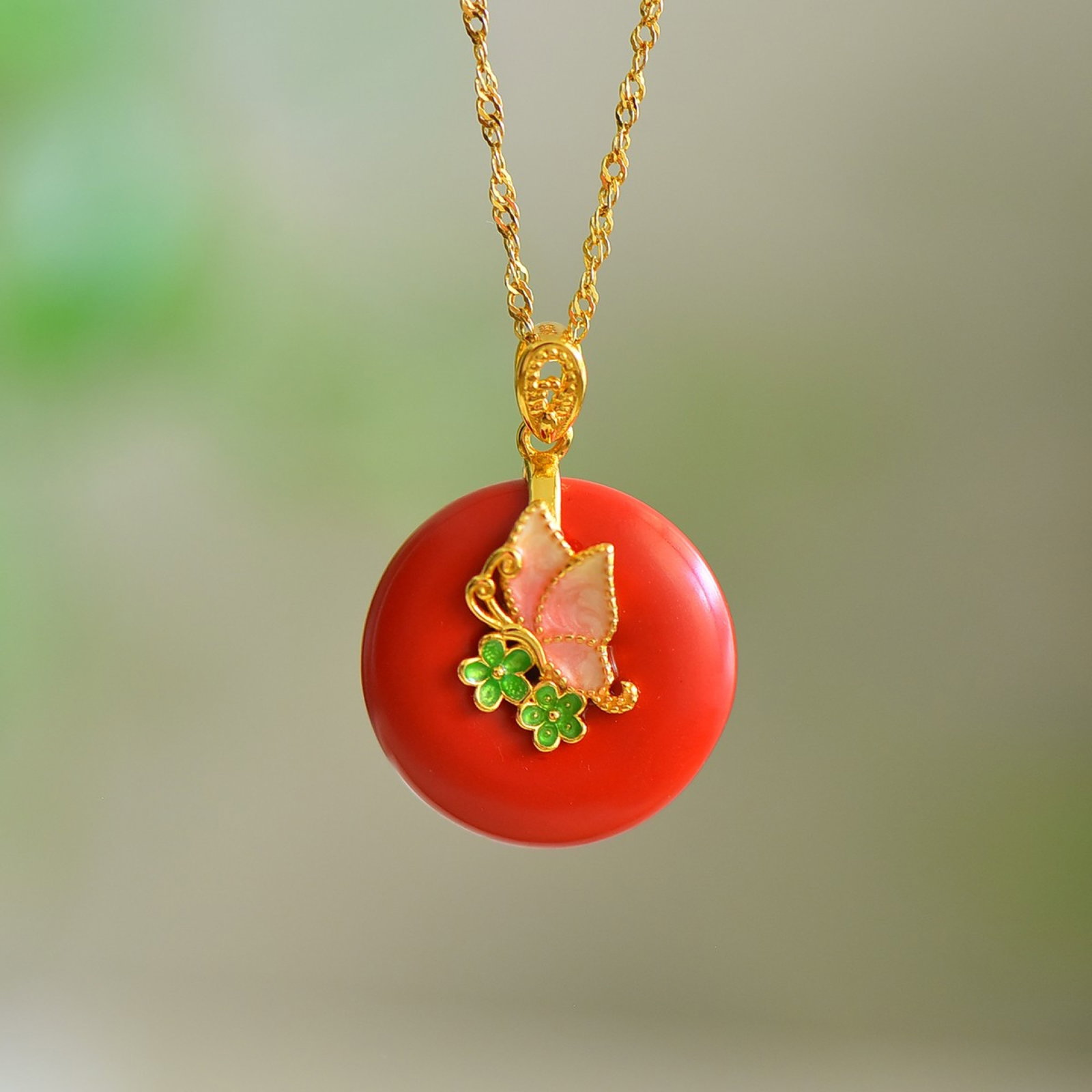 An Exquisite Sterling Silver-Gold Plated Inlaid Cinnabar Pendant: An Exquisite Sterling Silver-Gold Plated Inlaid Cinnabar Pendant,Size:0.7inx0.7in 寓意:平平安安,蝴蝶翩翩