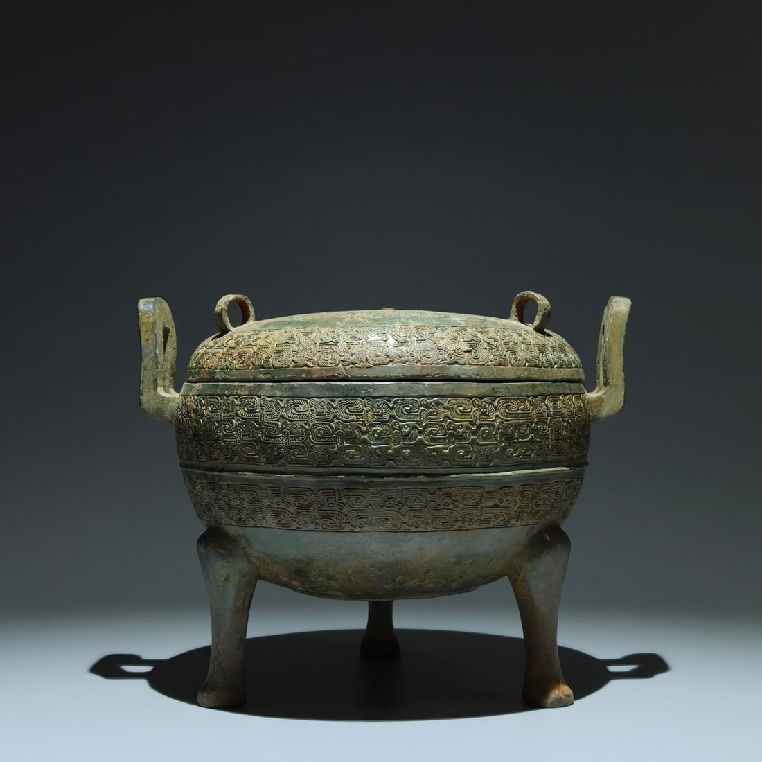 An Archaic Bronze Chi-Dragon Pattern Double-Ears and Tripod Censer: An Archaic Bronze Chi-Dragon Pattern Double-Ears and Tripod Censer,the Warring States period in China,Size:7.7inx9.8inx7.9in