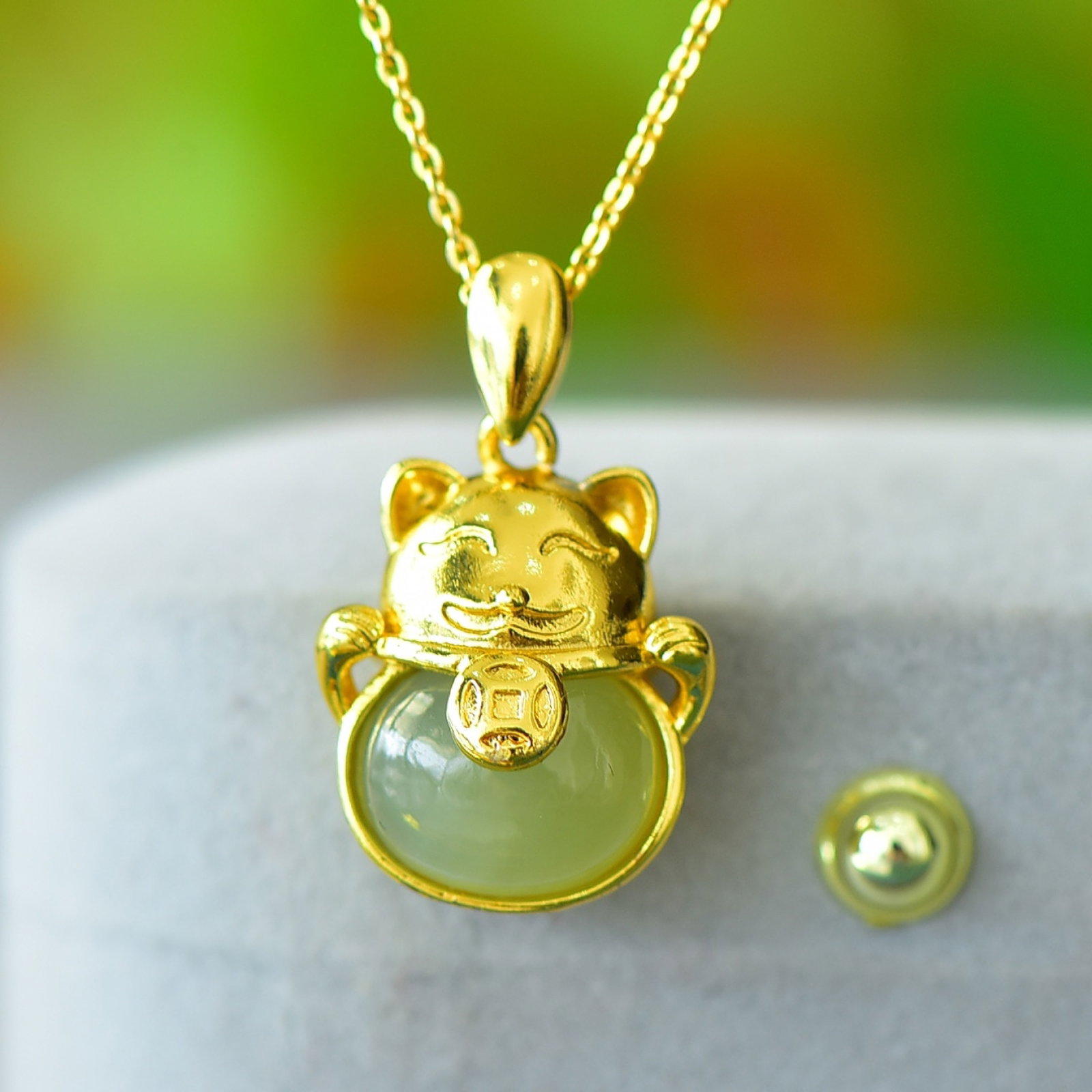 An Exquisite Bronze-Gold Plated Inlaid White Jade Cat Necklace: An Exquisite Bronze-Gold Plated Inlaid White Jade Cat Necklace,Size:0.4inx0.5in 铜镀金镶白玉猫项链