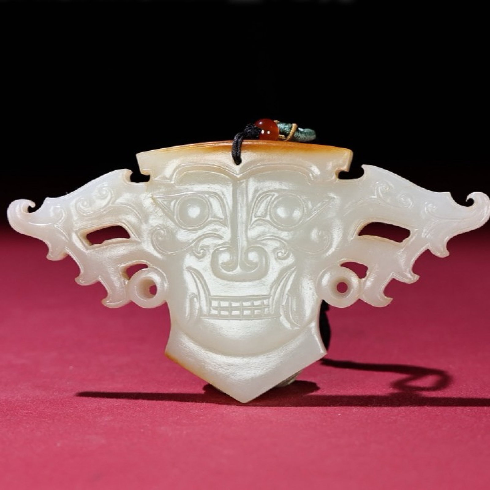 An Exquisite White Jade Beast-Face Pattern Ornament: An Exquisite White Jade Beast-Face Pattern Ornament,Qing Dynasty,China,Size:4.2inx2.2inx0.4in,Weight:72g 白玉兽面纹摆件,中国清代