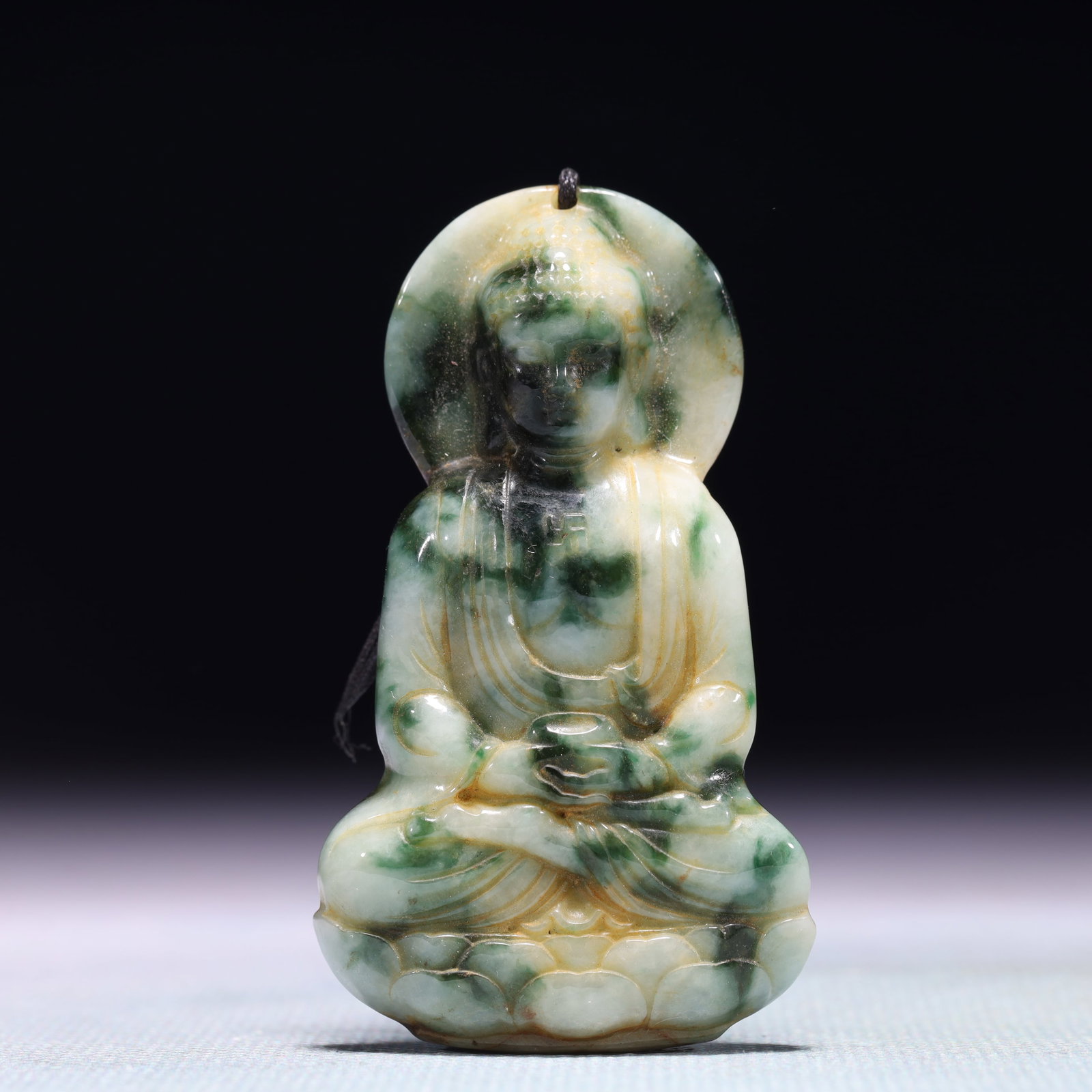 An Exquisite Jadeite Statue of Sakyamuni: An Exquisite Jadeite Statue of Sakyamuni,Qing Dynasty,China,Size:1.4inx0.4inx2.4in,Weight:44.1g 翡翠释迦摩尼像,中国清代