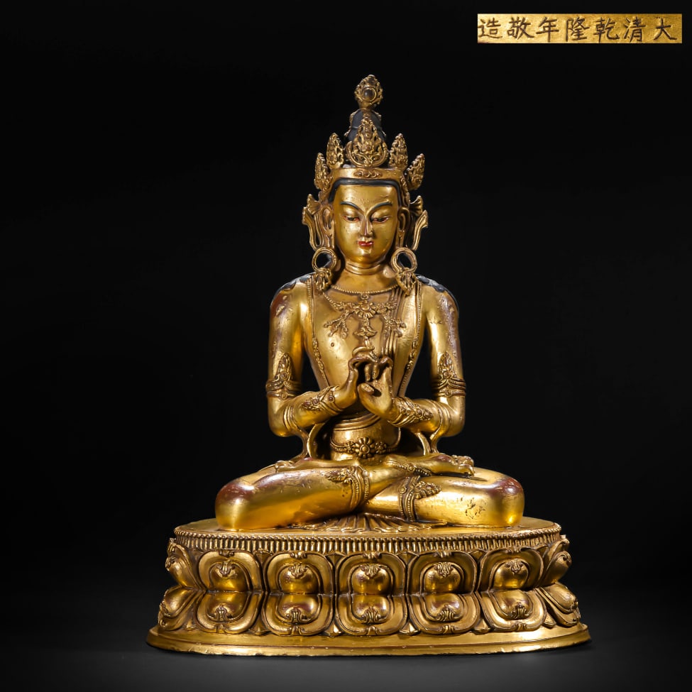 A Solemn Gilt Bronze Statue of Mah??vairocana: A Solemn Gilt Bronze Statue of Mahāvairocana,Qing Dynasty,China,Qianlong Mark,Size:6.7inx5.1inx8.7in,Weight:1800g