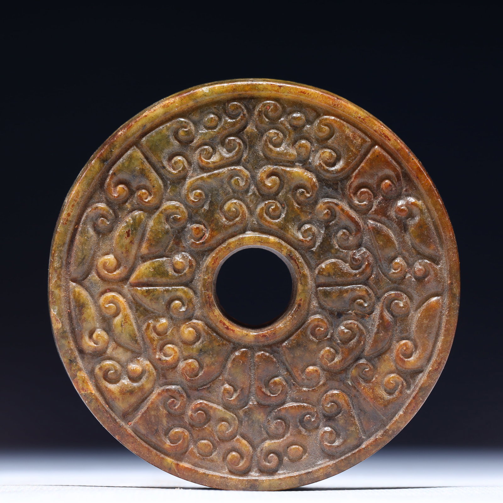 An Exquisite Archaic Jade Flower Pattern Ornament: An Exquisite Archaic Jade Flower Pattern Ornament,Ancient Time,China,Size:3inx0.4in,Weight:115g 高古玉花卉纹摆件,中国远古时